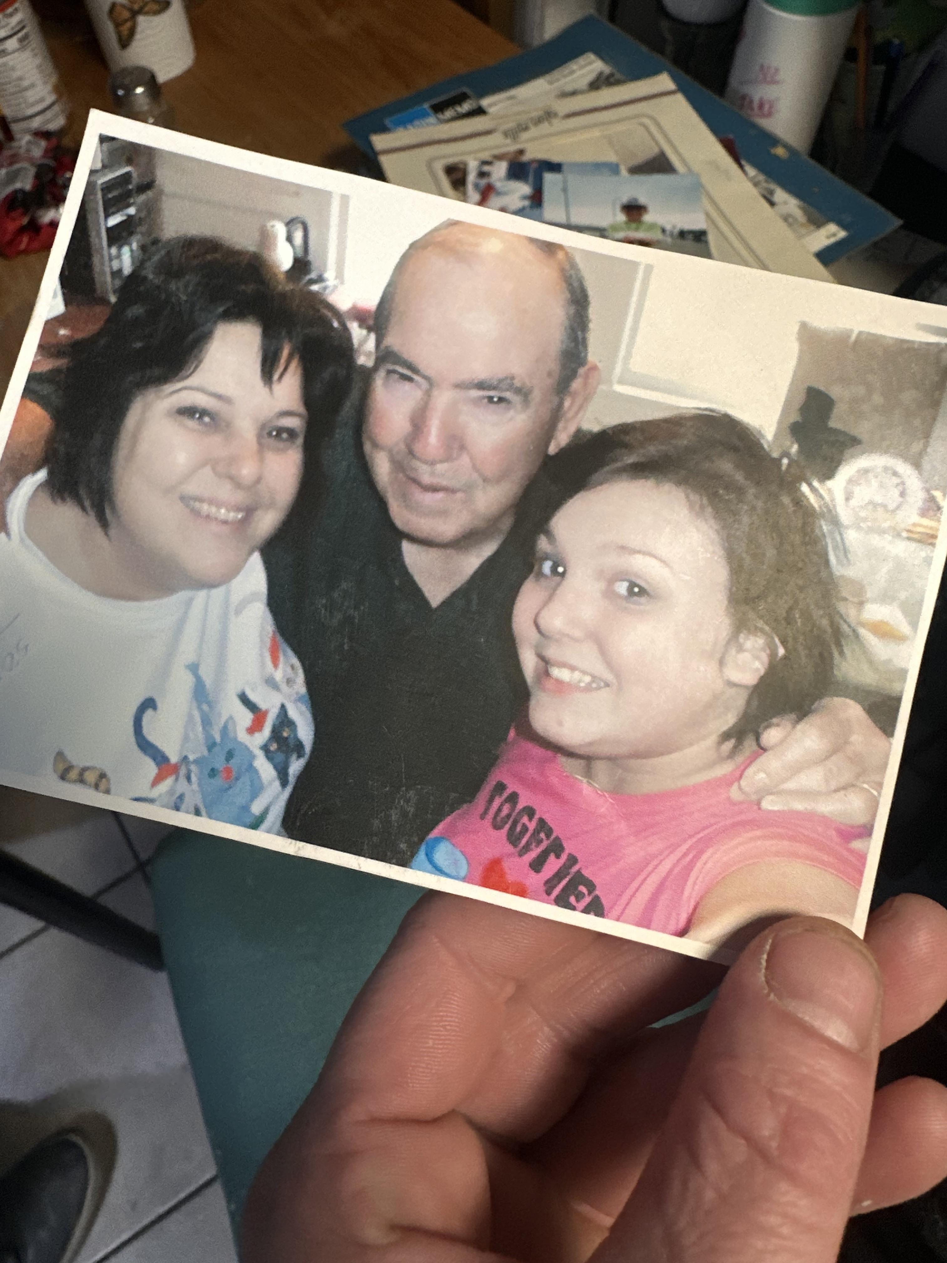 A man and woman posing for a picture