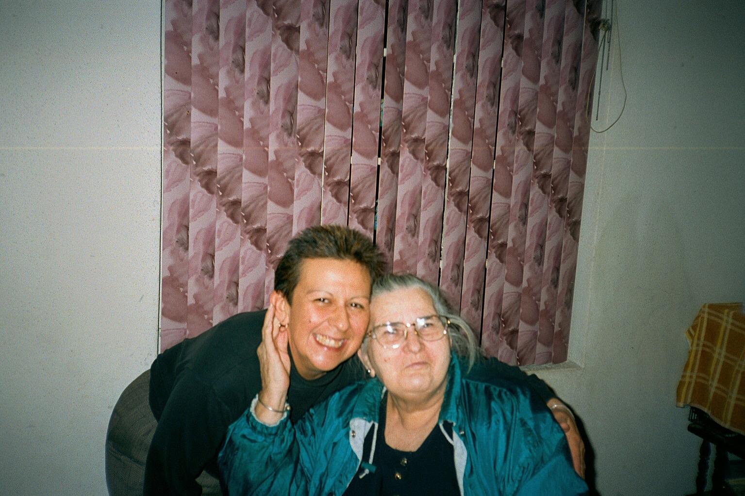 A man and woman posing for a picture