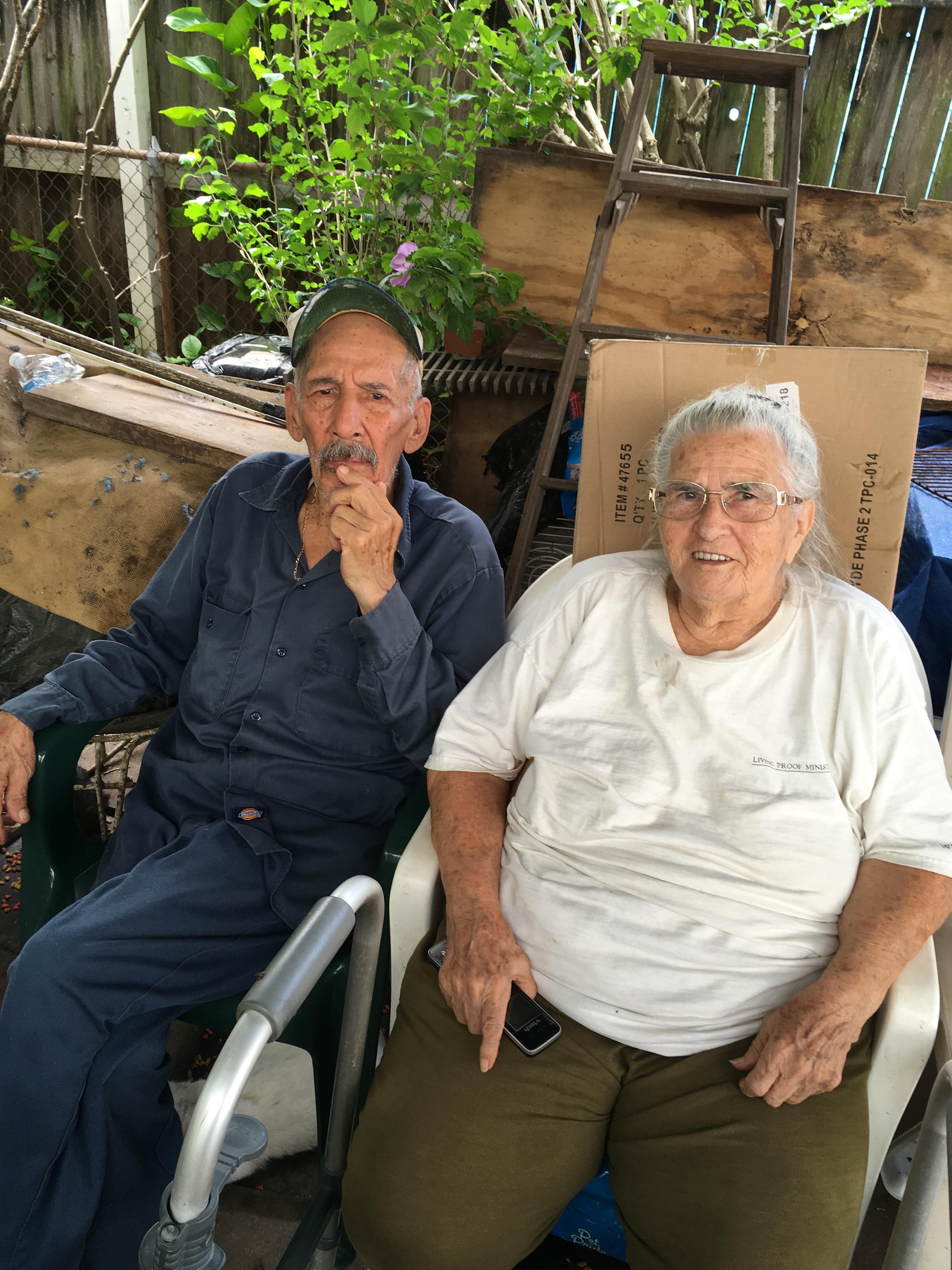 A man and woman sitting in chairs