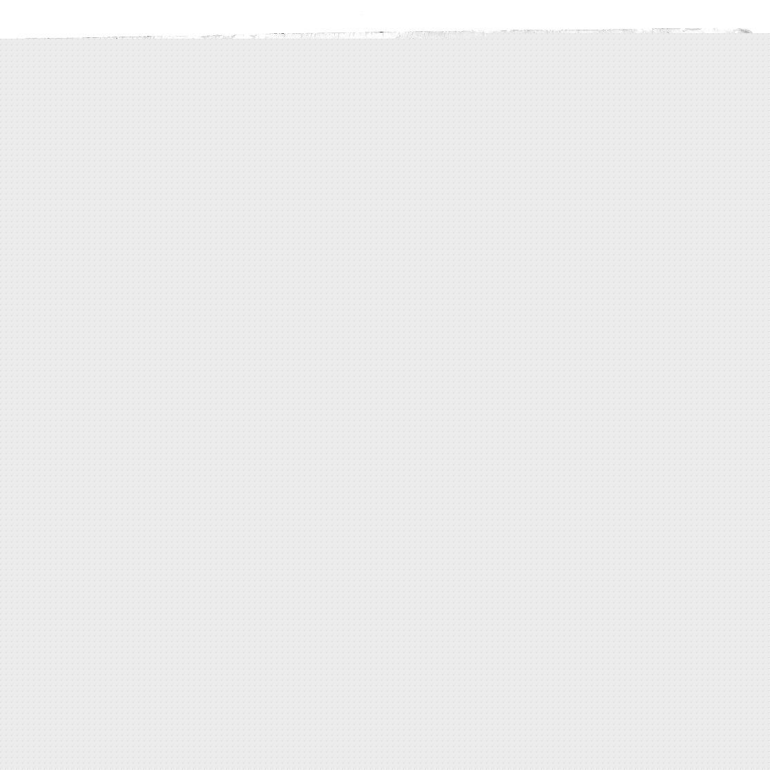 A white rectangular object with dots