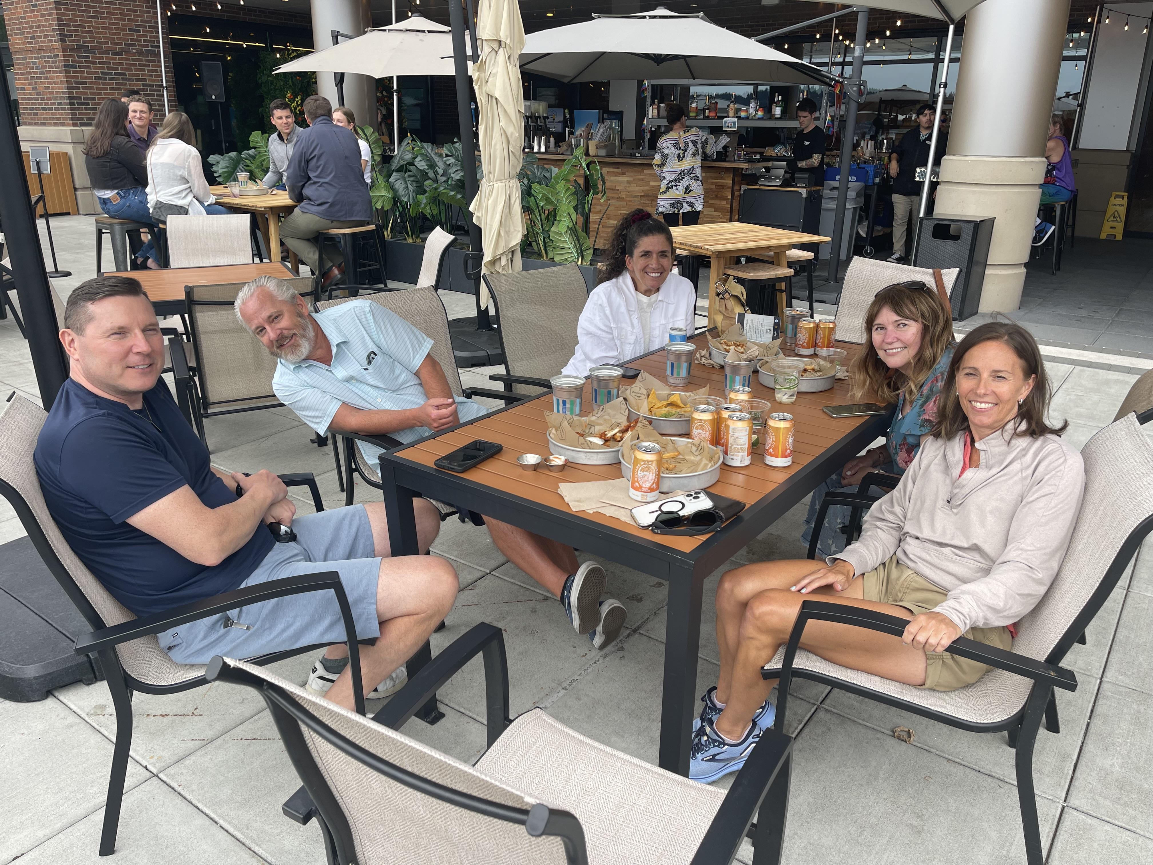A group of people sitting at a table