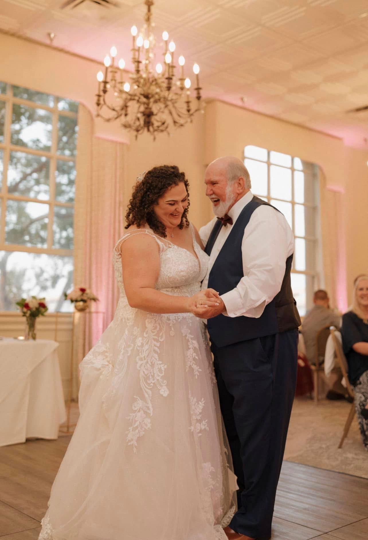A man and woman dancing in a room