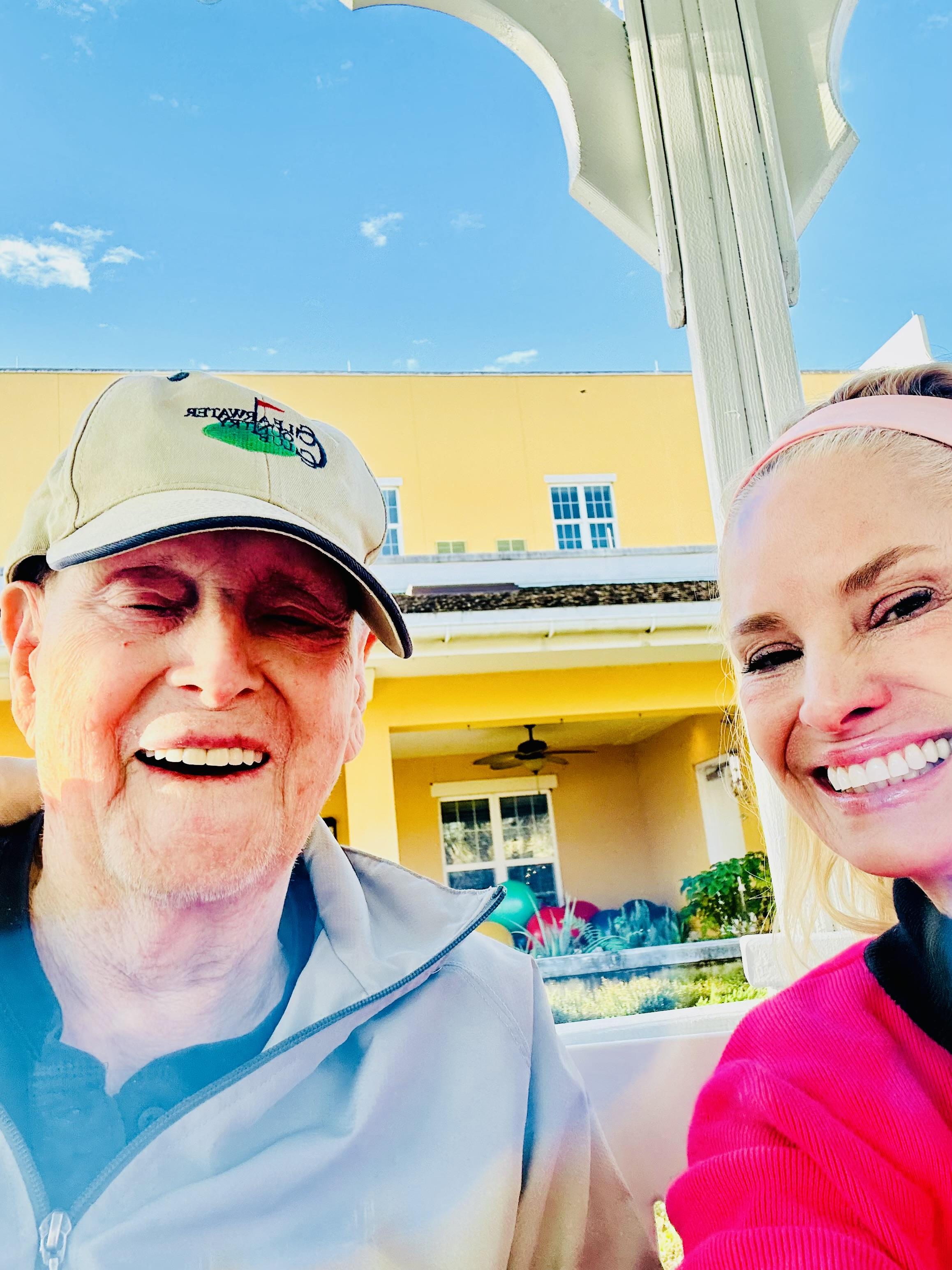A man and woman smiling for a picture