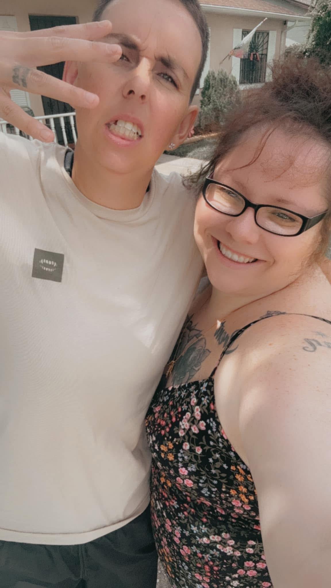 A man and woman taking a selfie