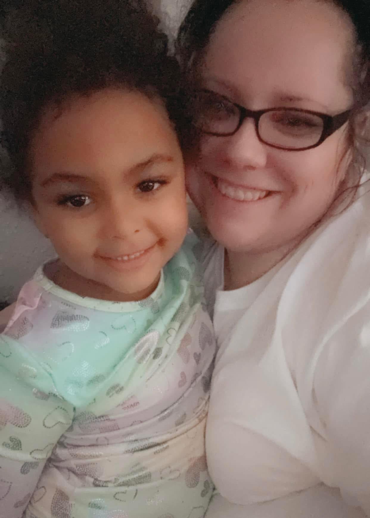 A woman and a child taking a selfie