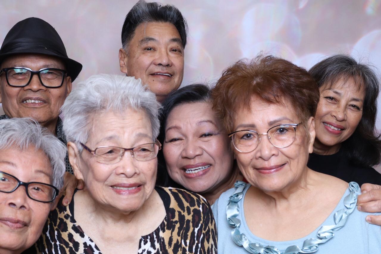 A group of older people smiling