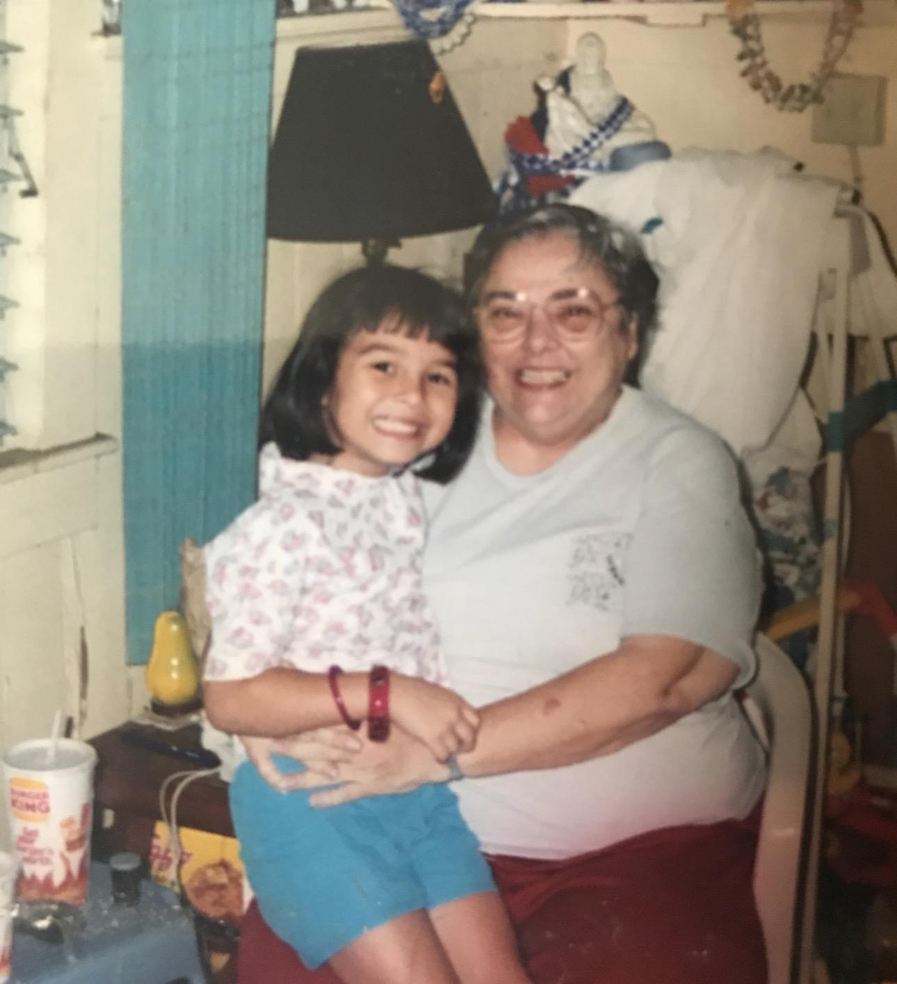 A woman holding a girl