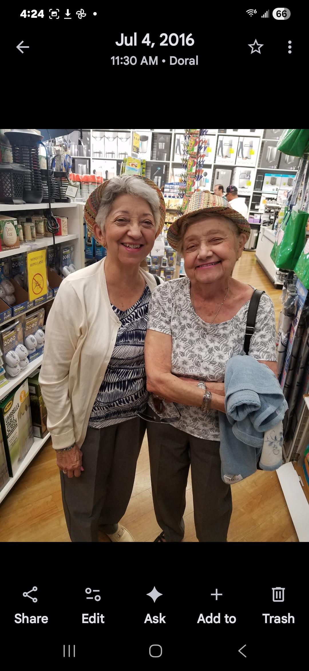 Two women standing together in a store