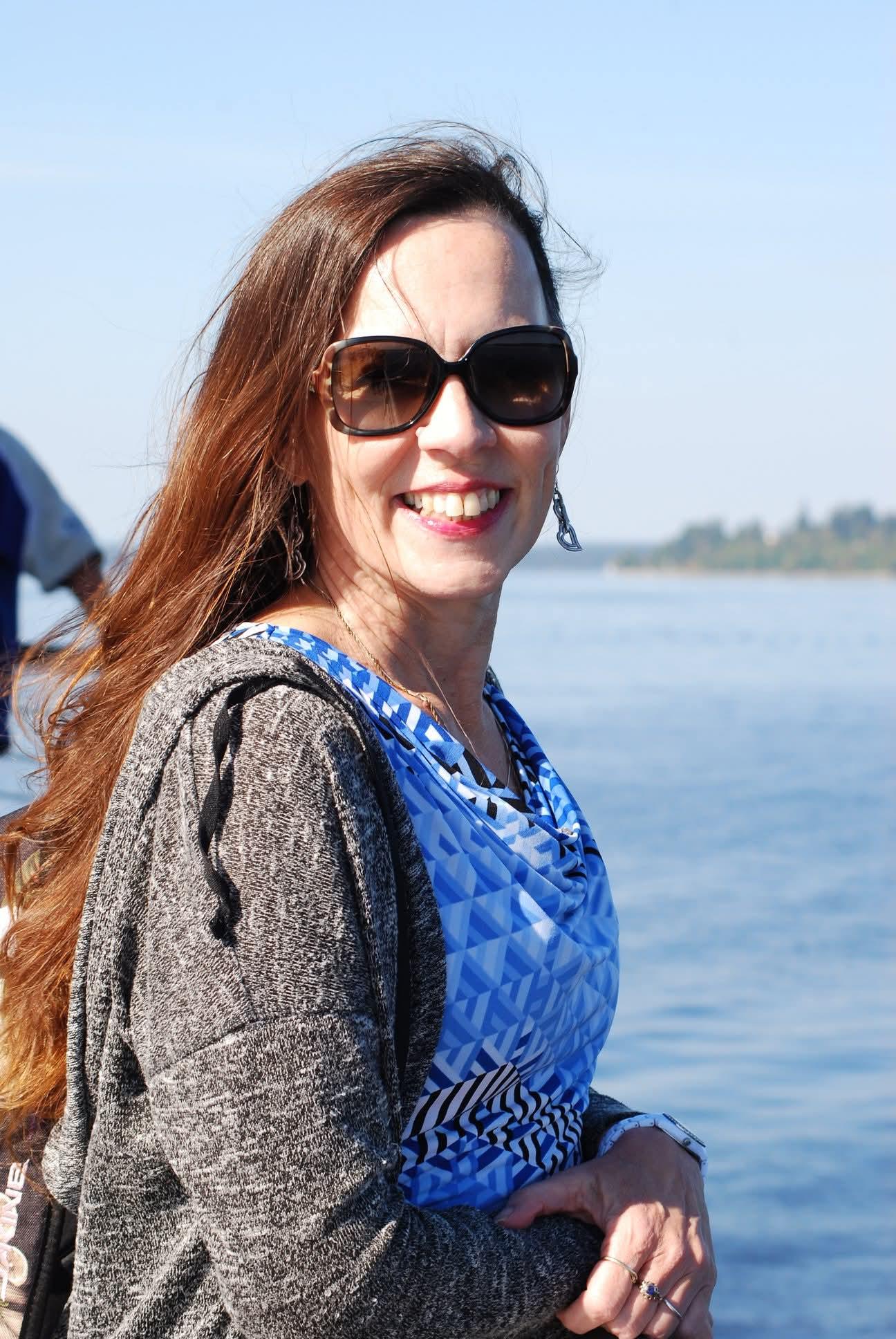 A woman smiling at the camera