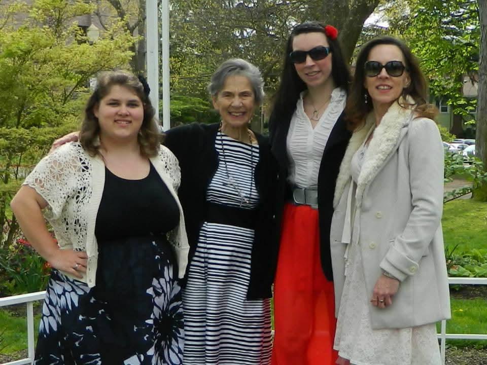 A group of women posing for a photo