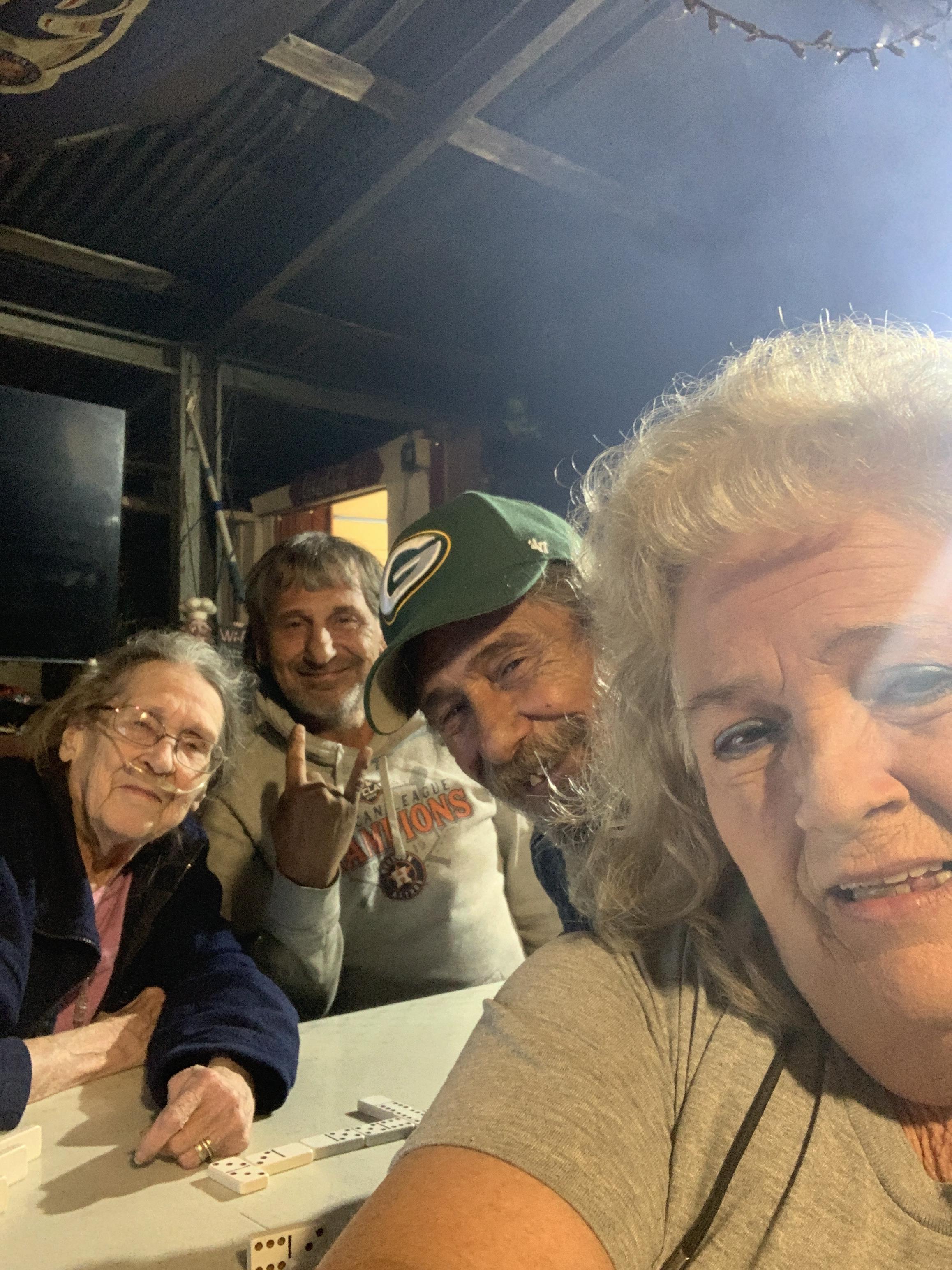 A group of people taking a selfie