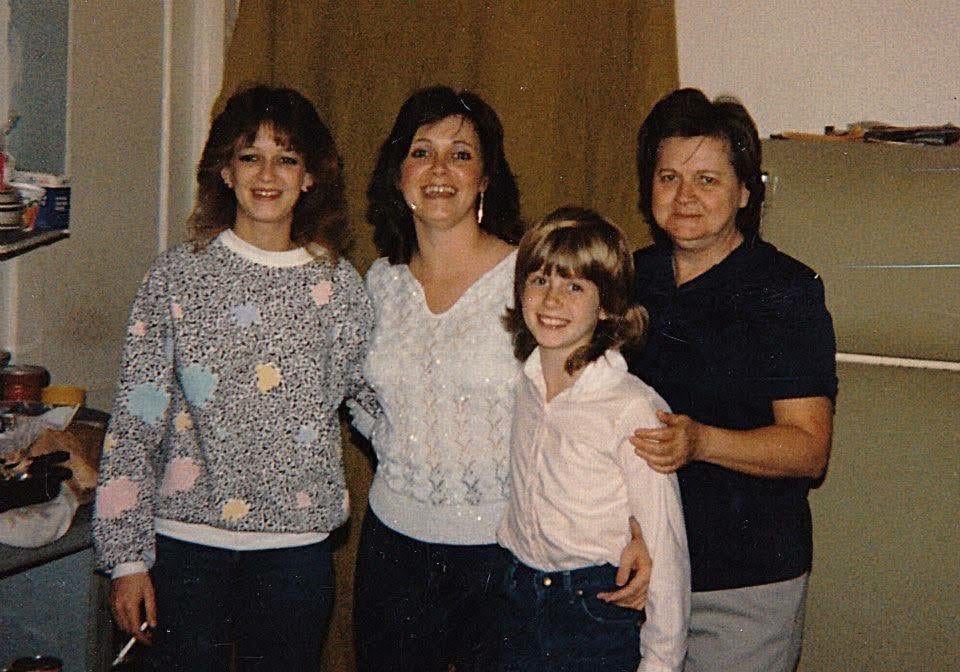 A group of women posing for a photo