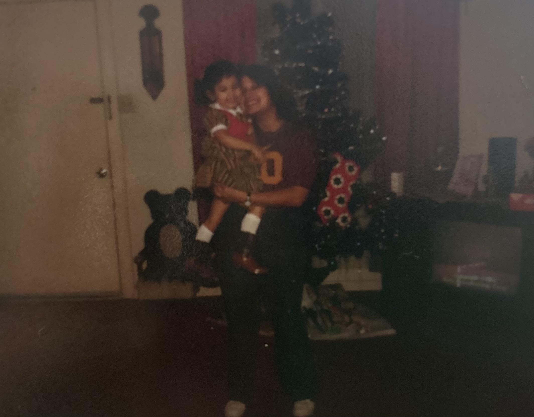 A woman holding a child