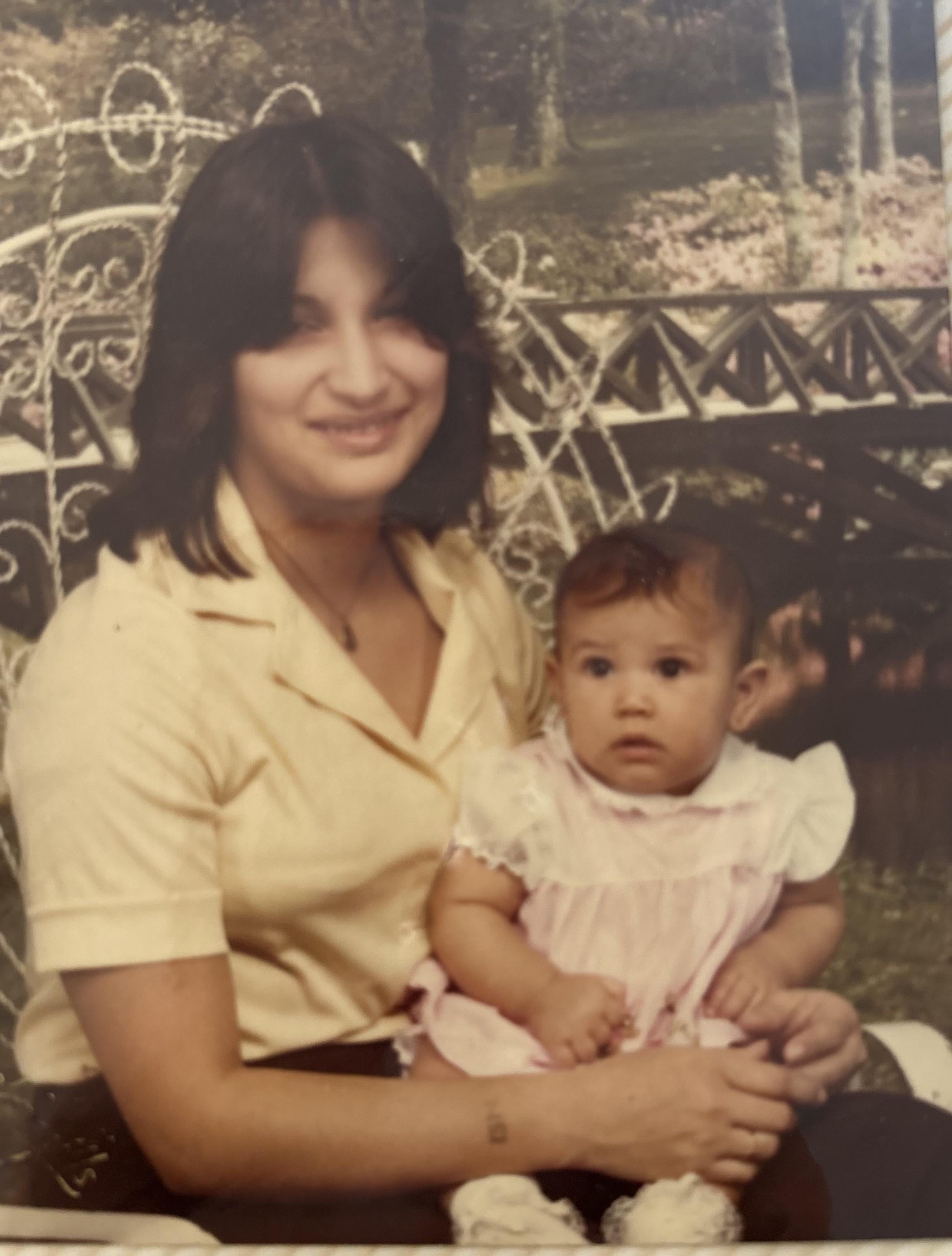 A woman holding a baby