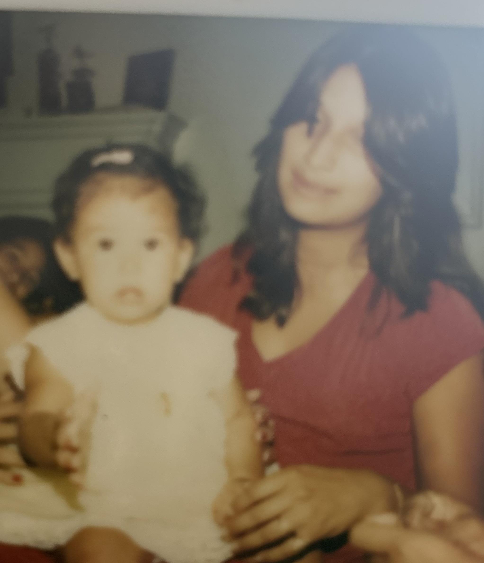 A woman holding a baby