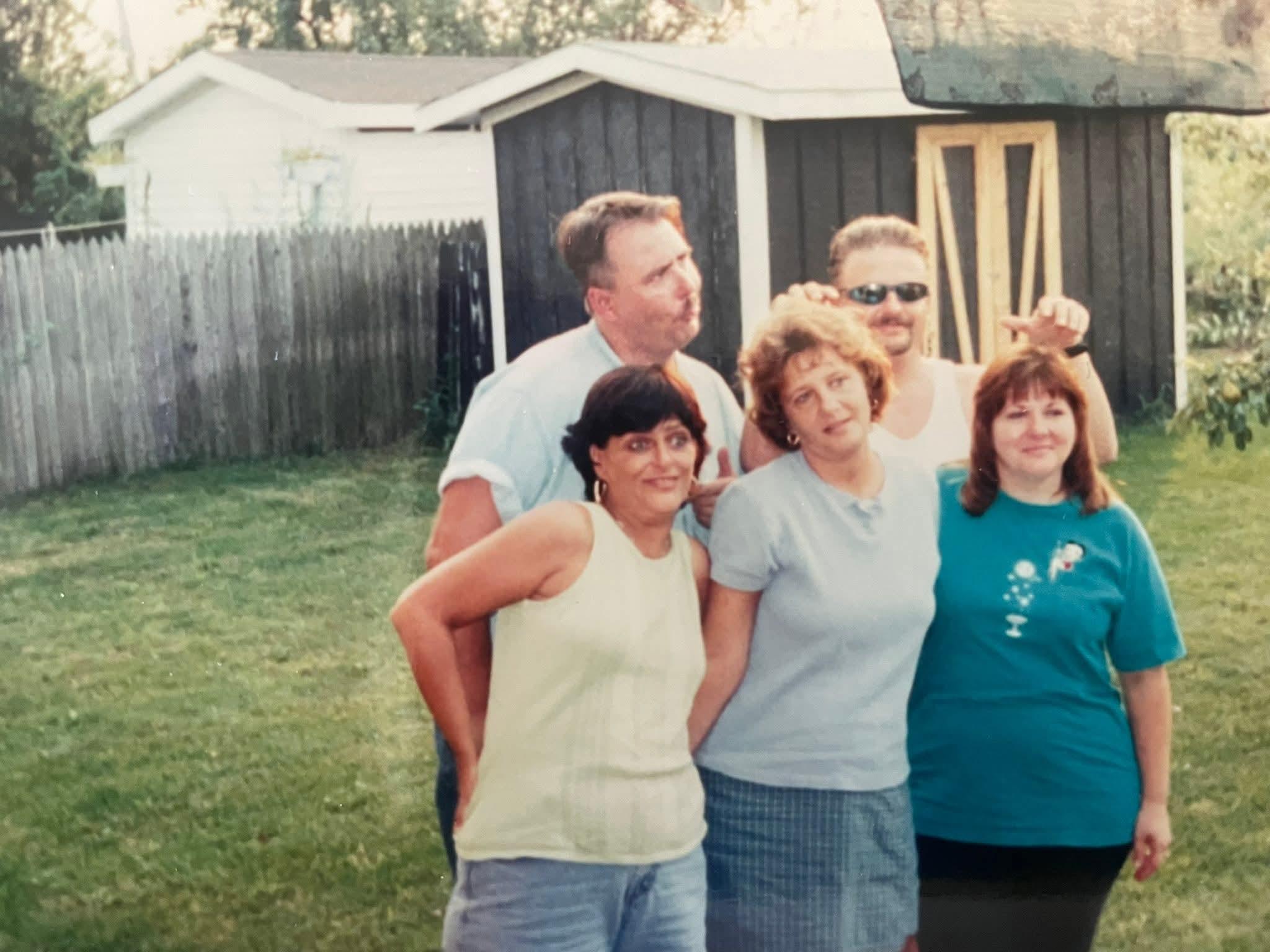 A group of people posing for a photo