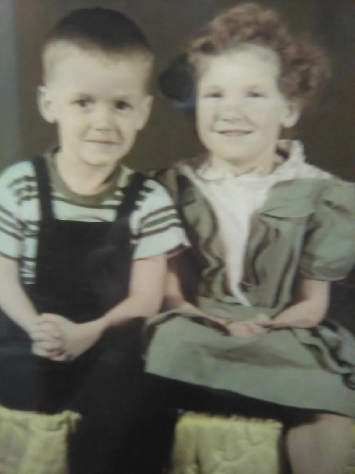 A boy and girl sitting together