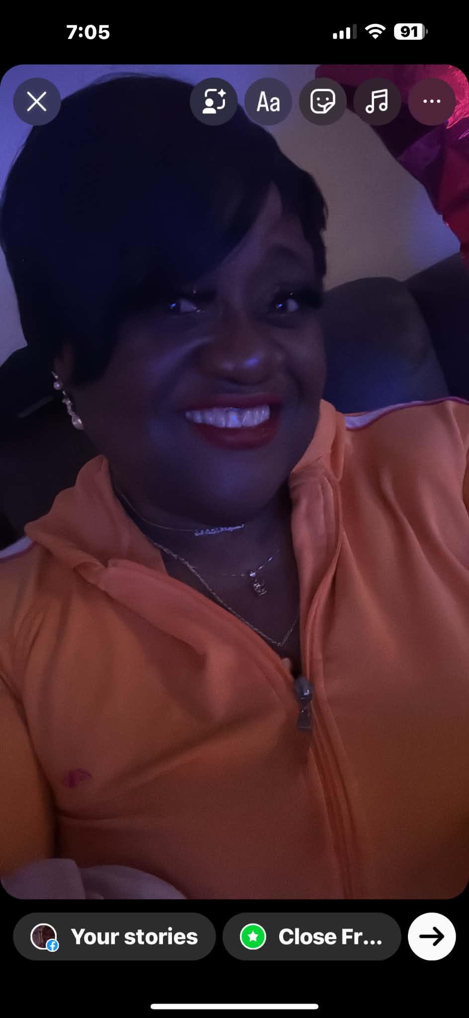A woman smiling at the camera