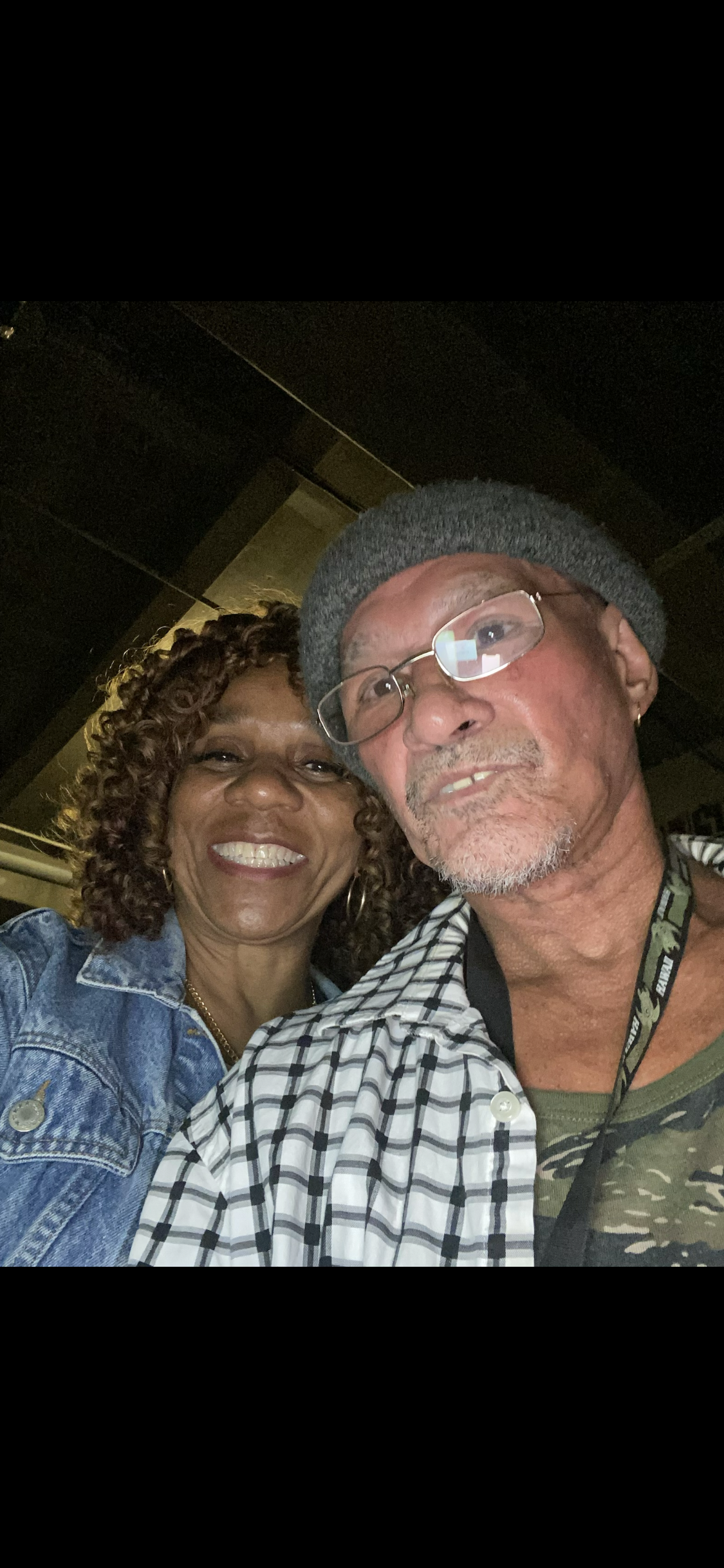 A man and woman taking a selfie