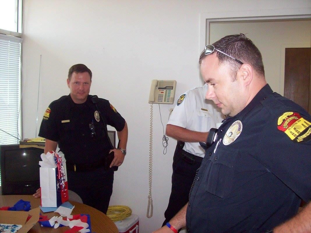 A police officers looking at something
