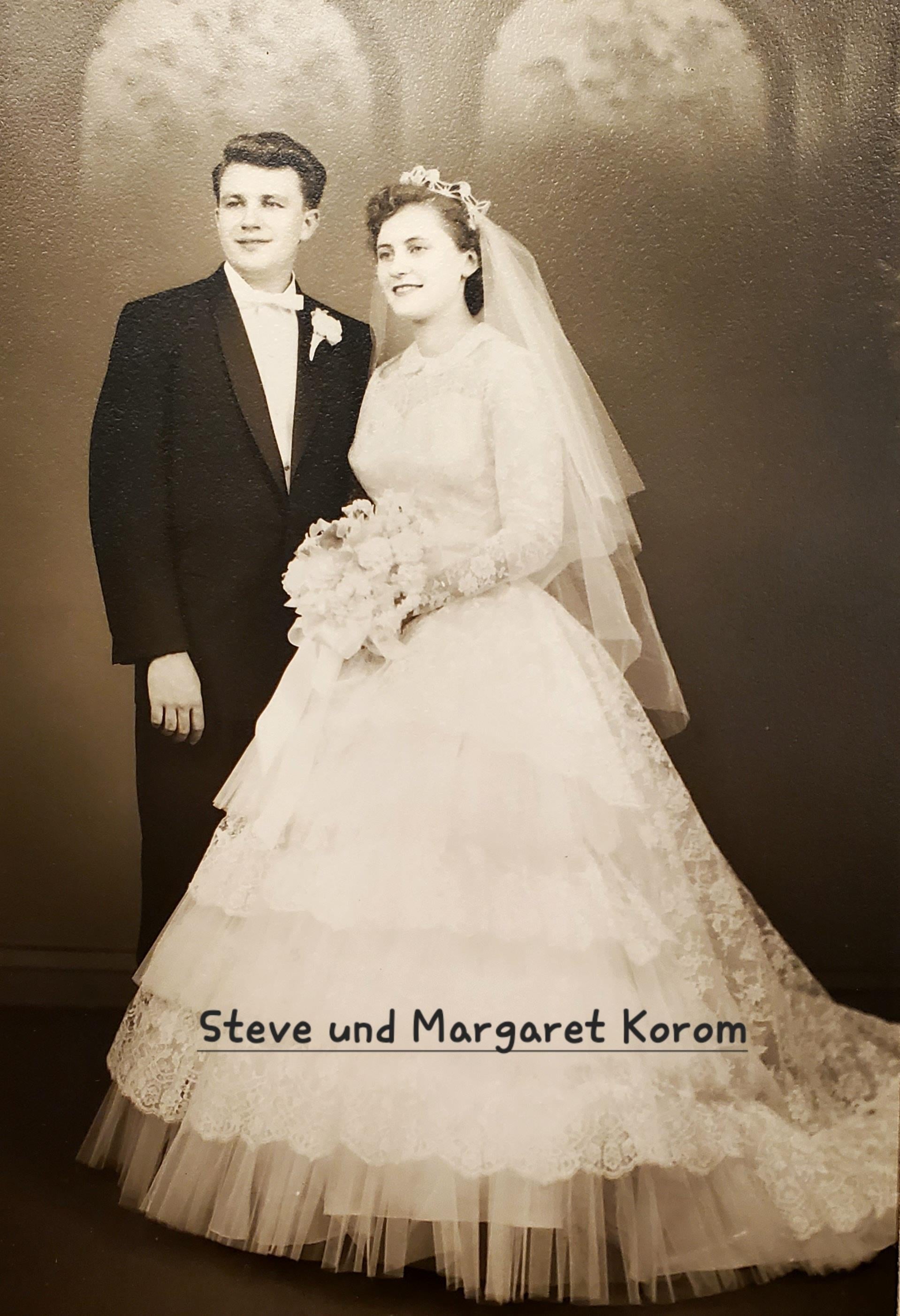 A man and woman in wedding attire