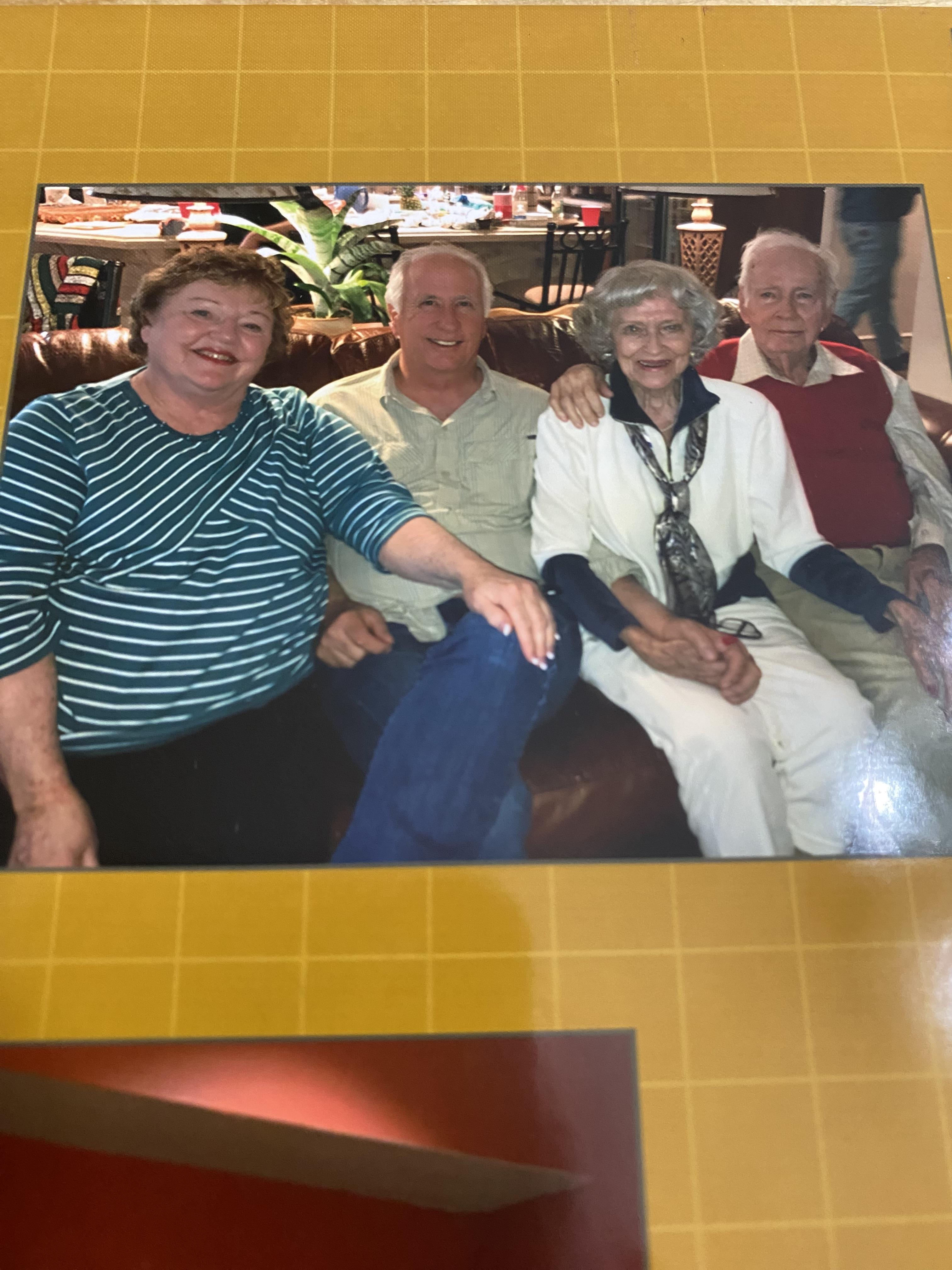 A group of people sitting on a couch