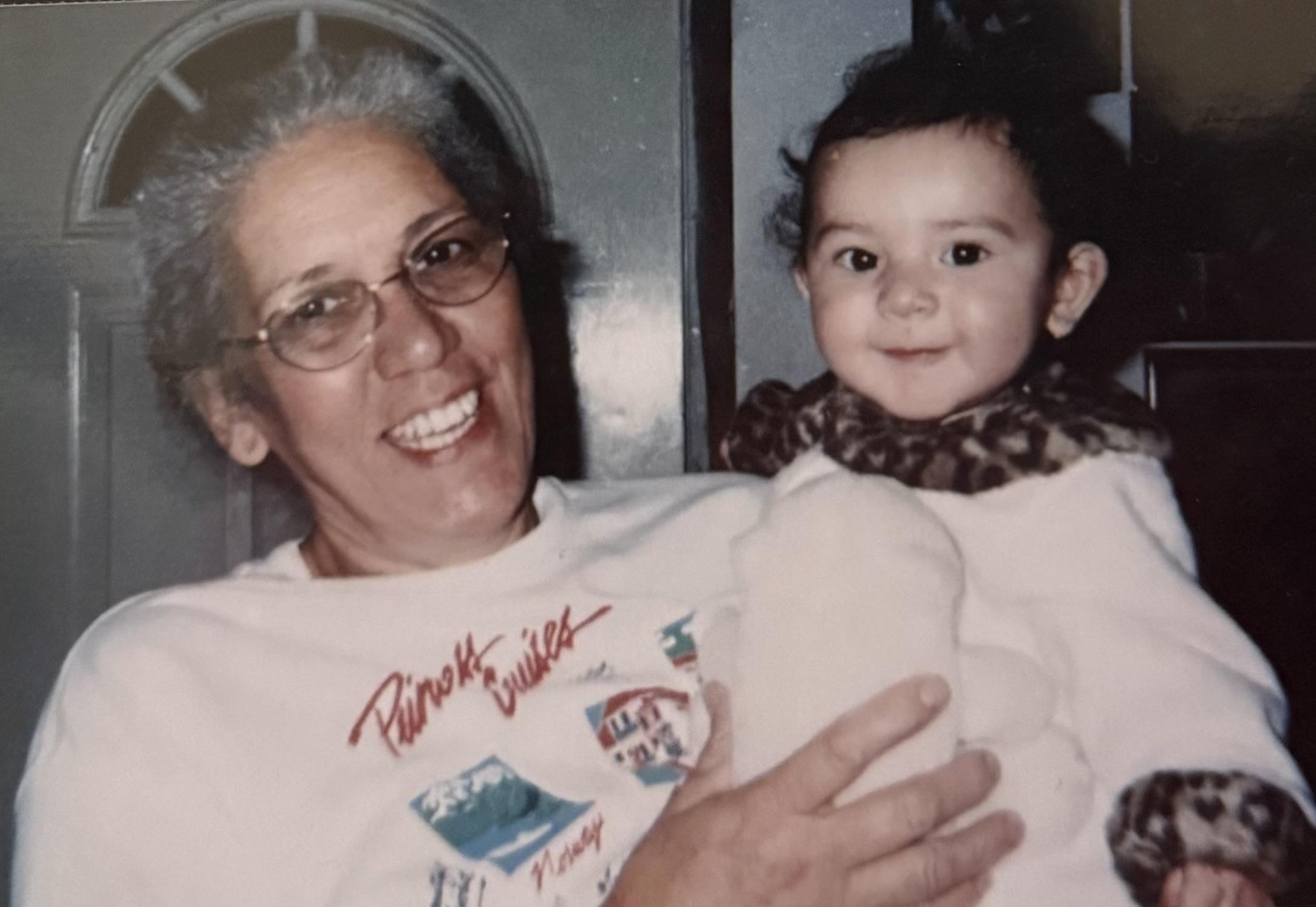 A woman holding a baby