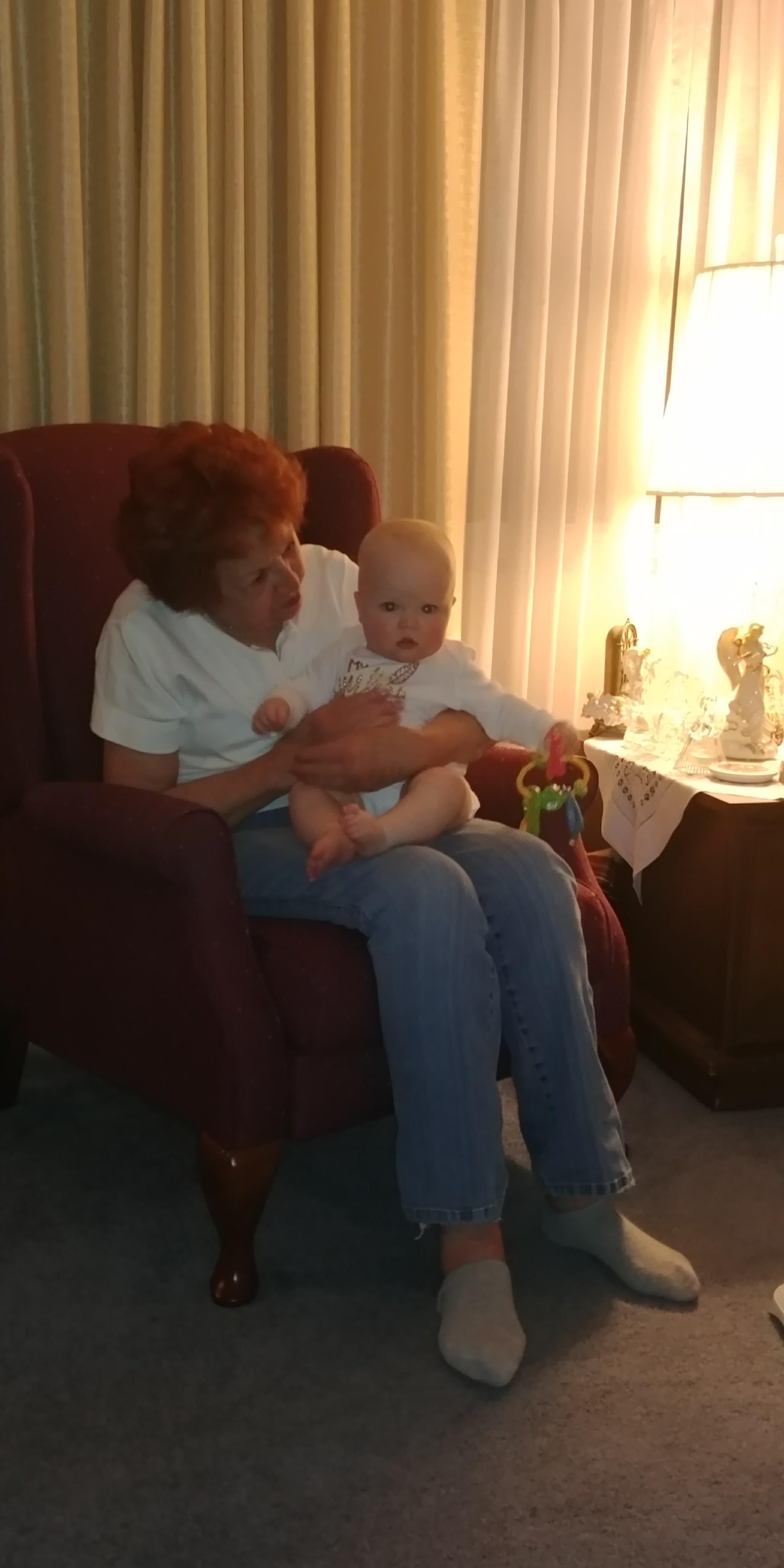A woman holding a baby