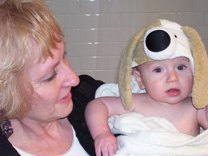 A woman holding a baby