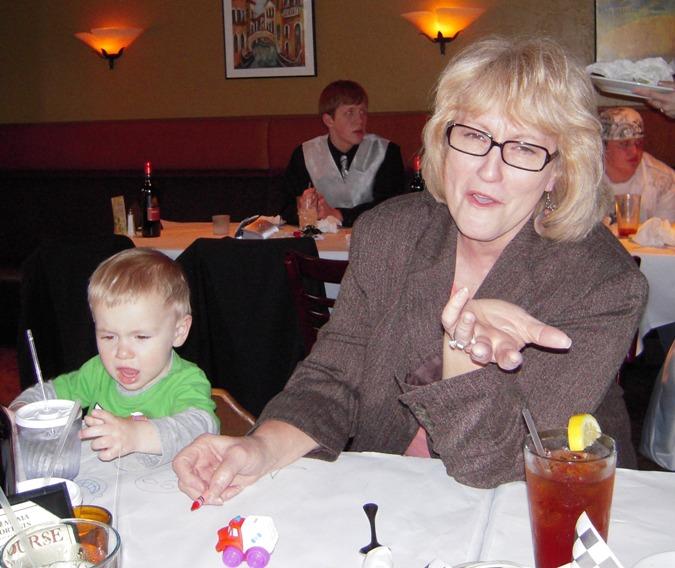 A woman and a child sitting at a table