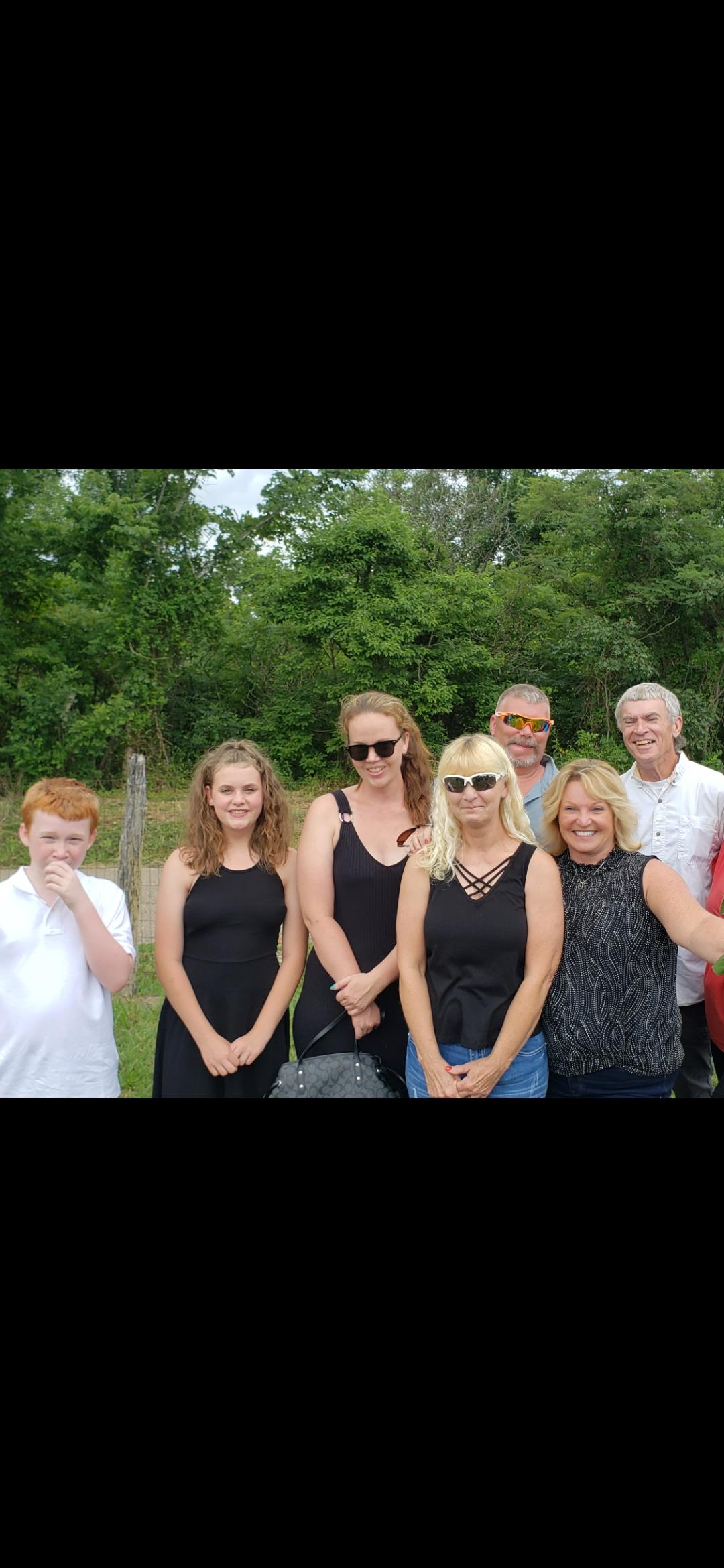 A group of people posing for a photo