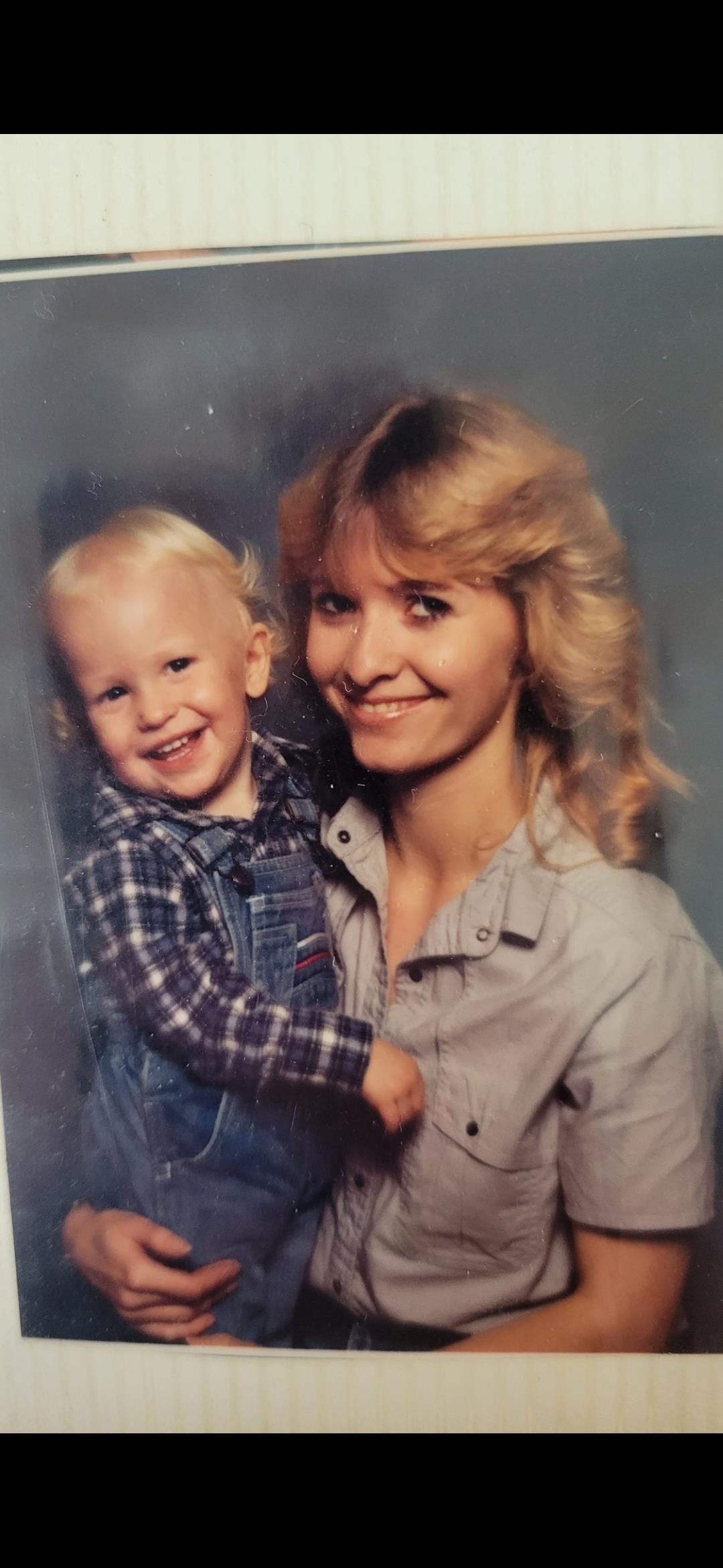 A woman holding a baby