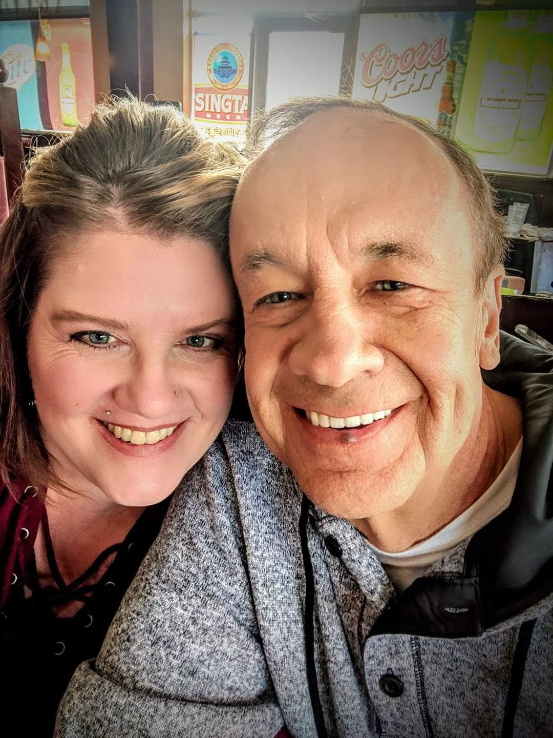 A man and woman taking a selfie