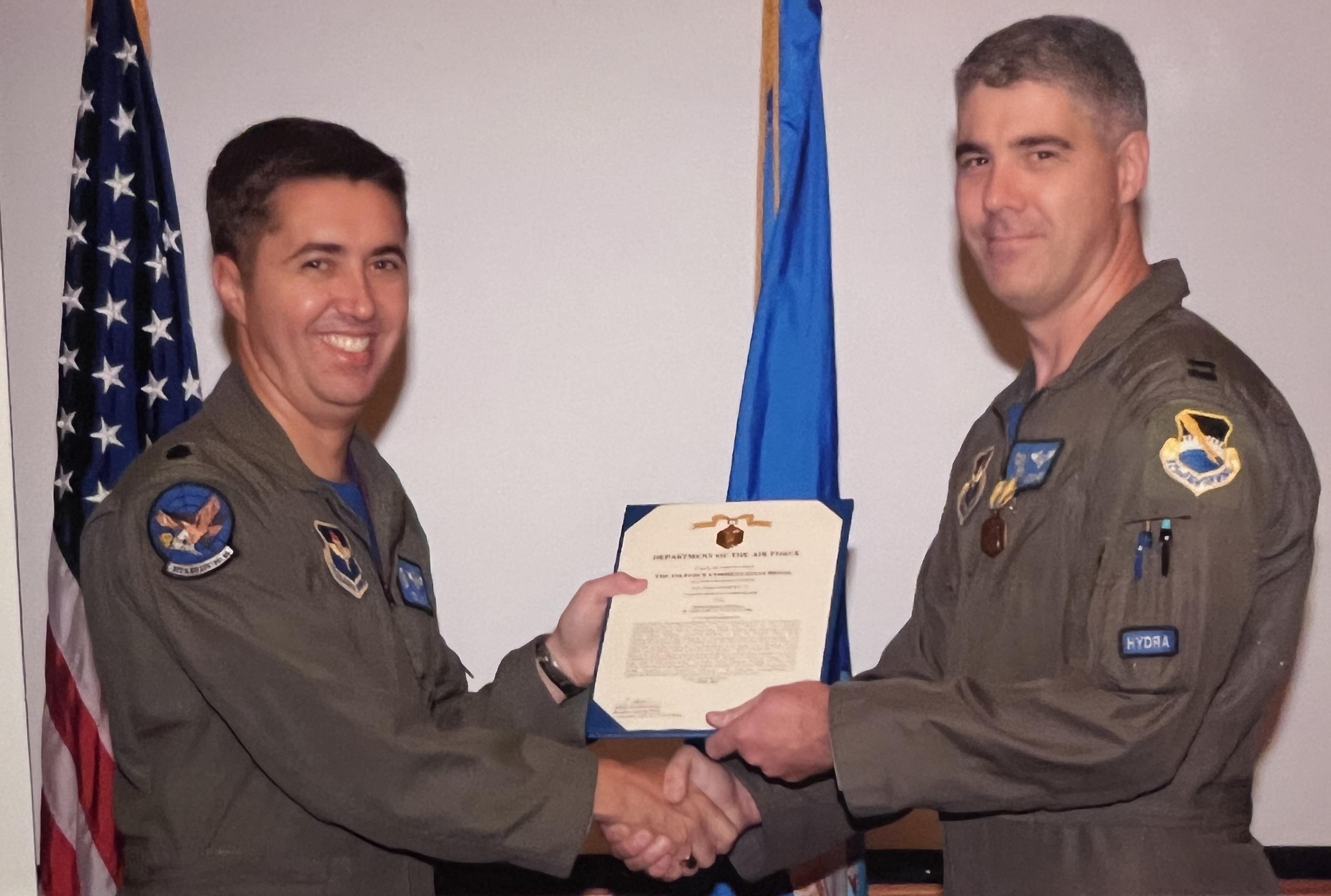 A couple of men shaking hands