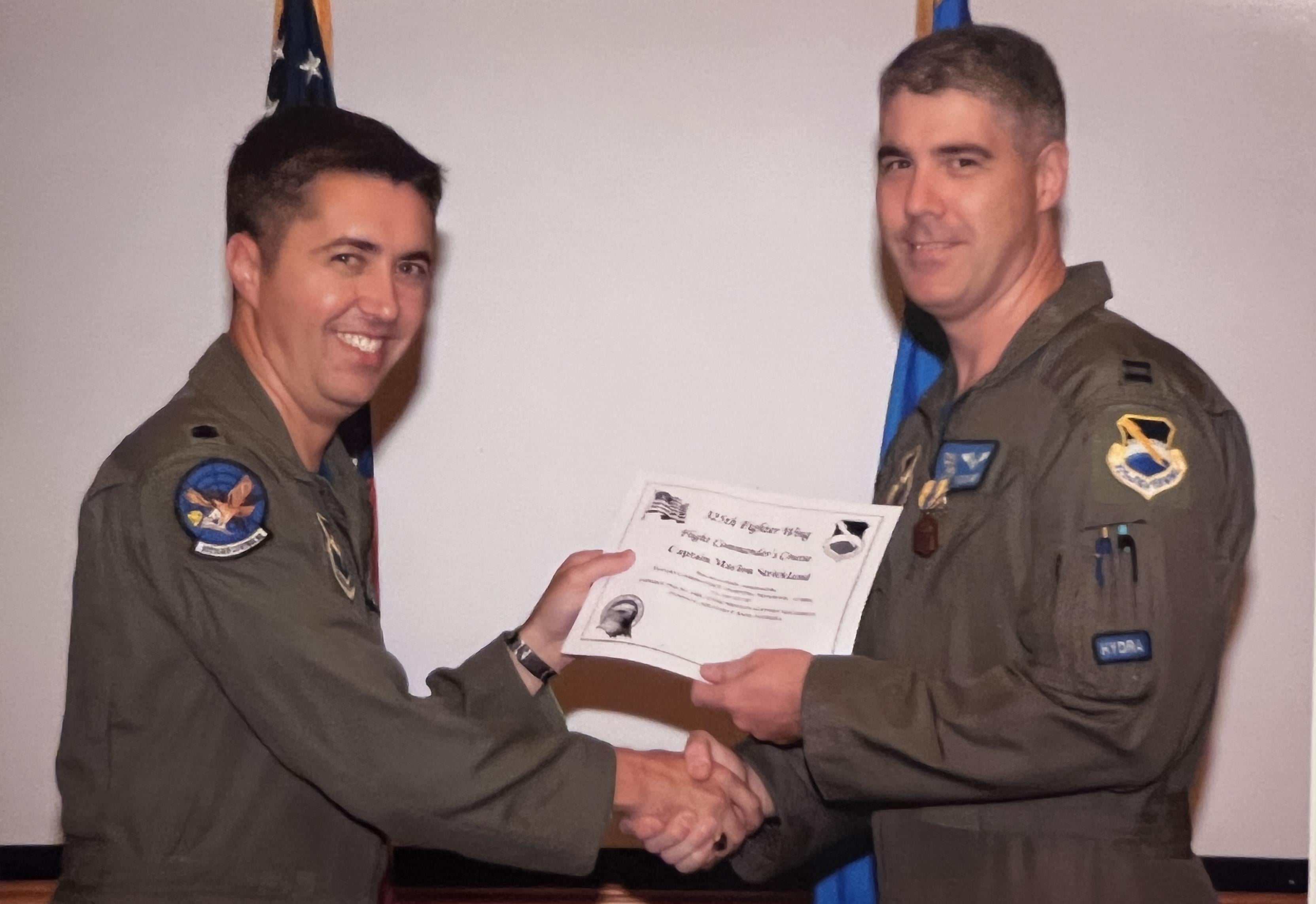 A couple of men shaking hands
