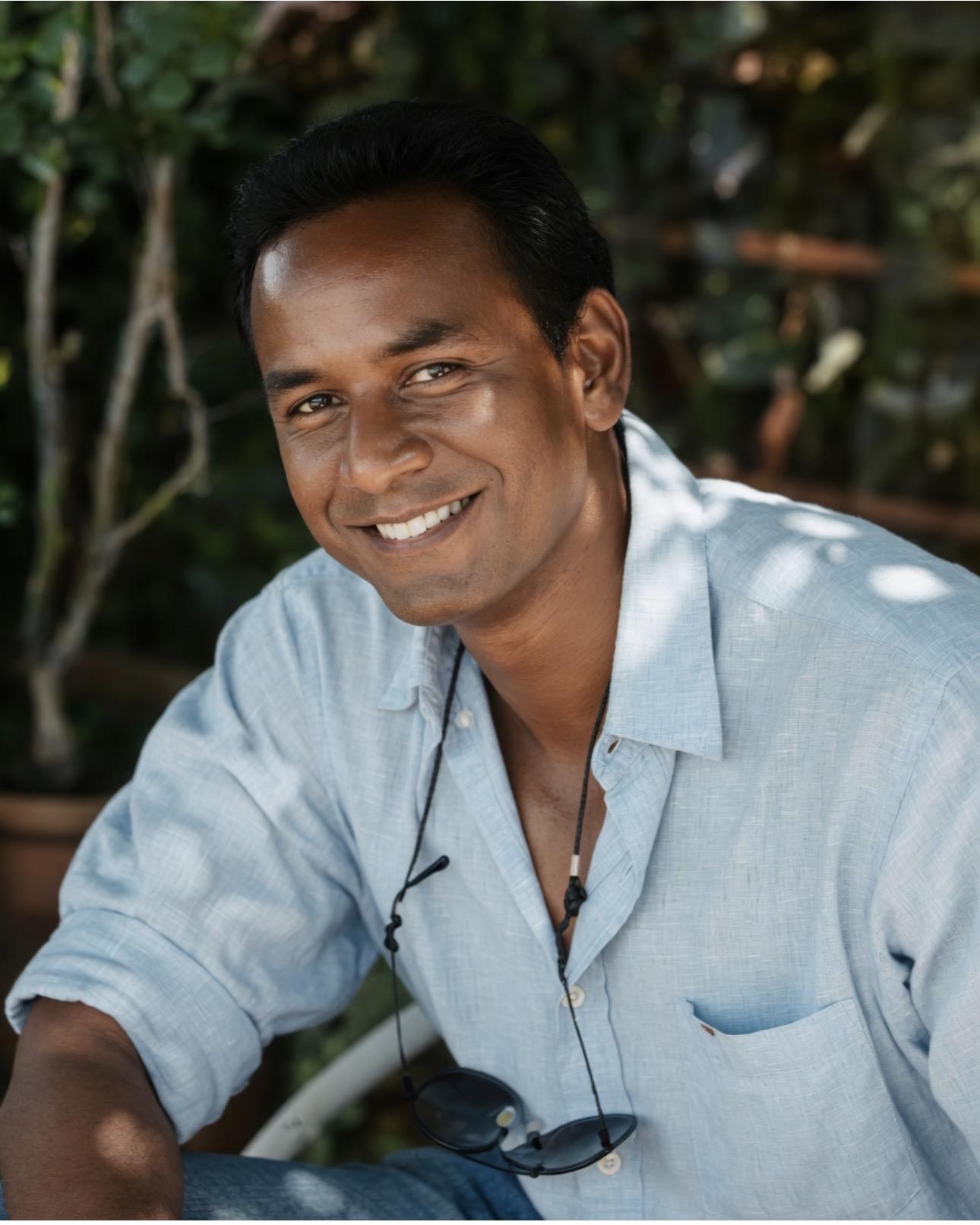 A man smiling at the camera
