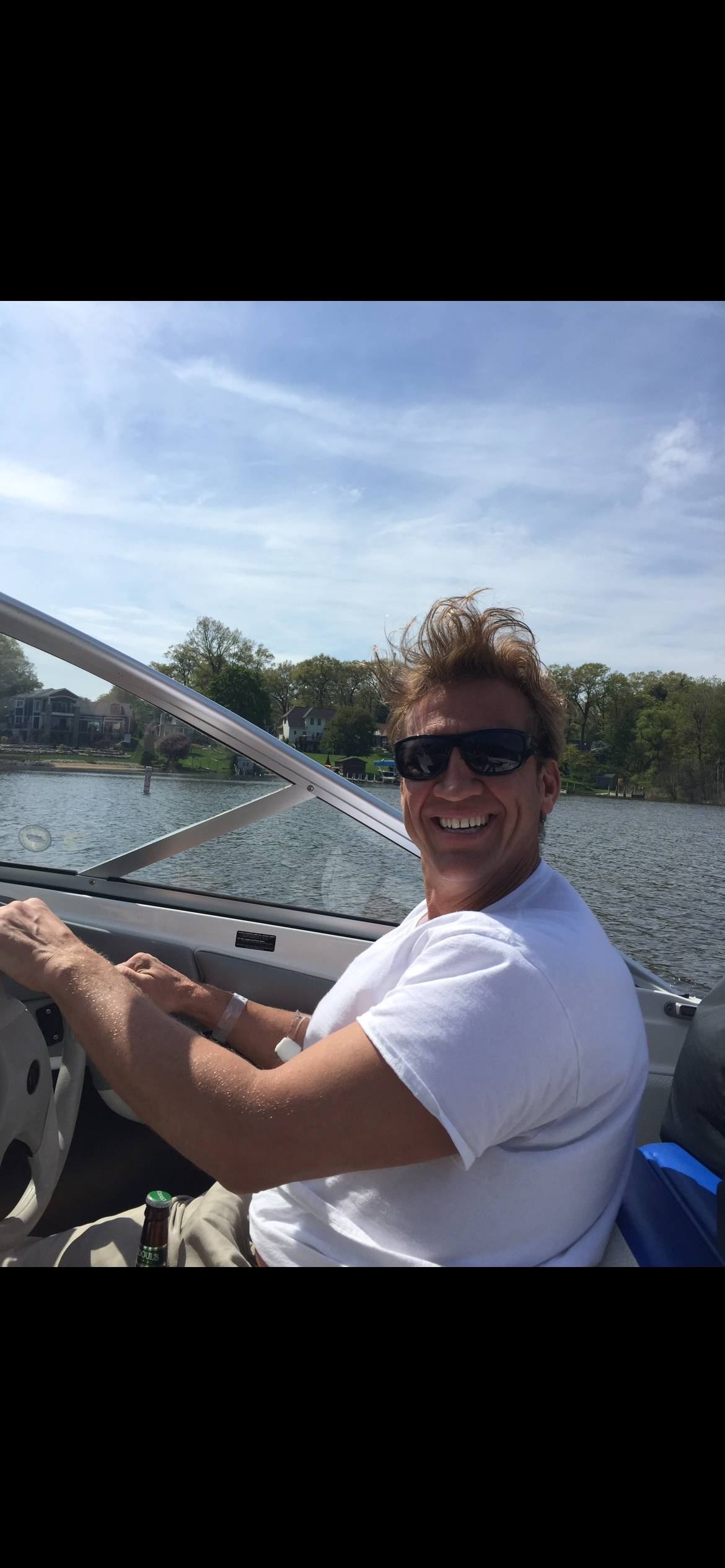 A man driving a boat