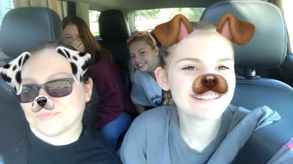 A group of people in a car