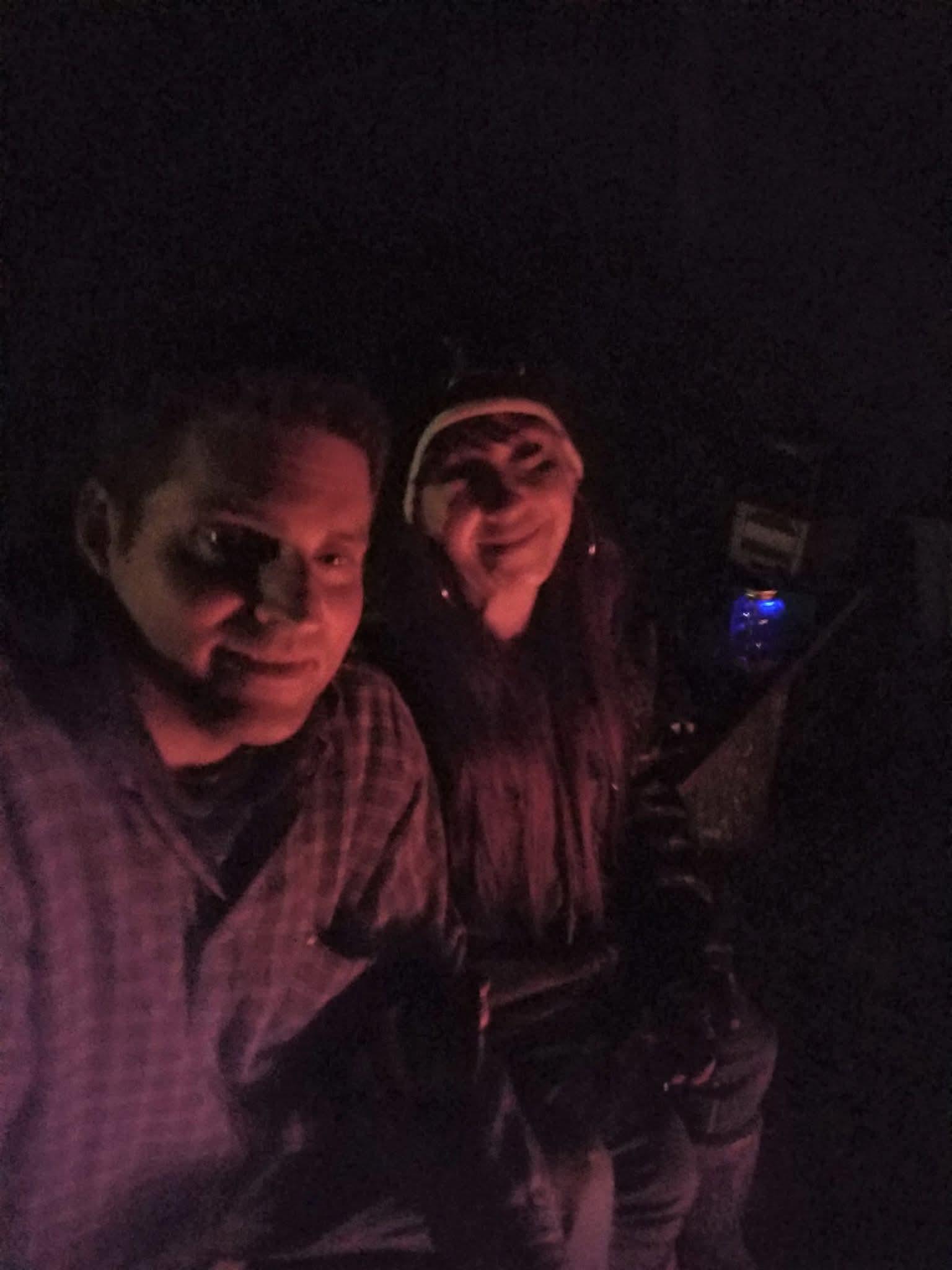 A couple of people taking a selfie