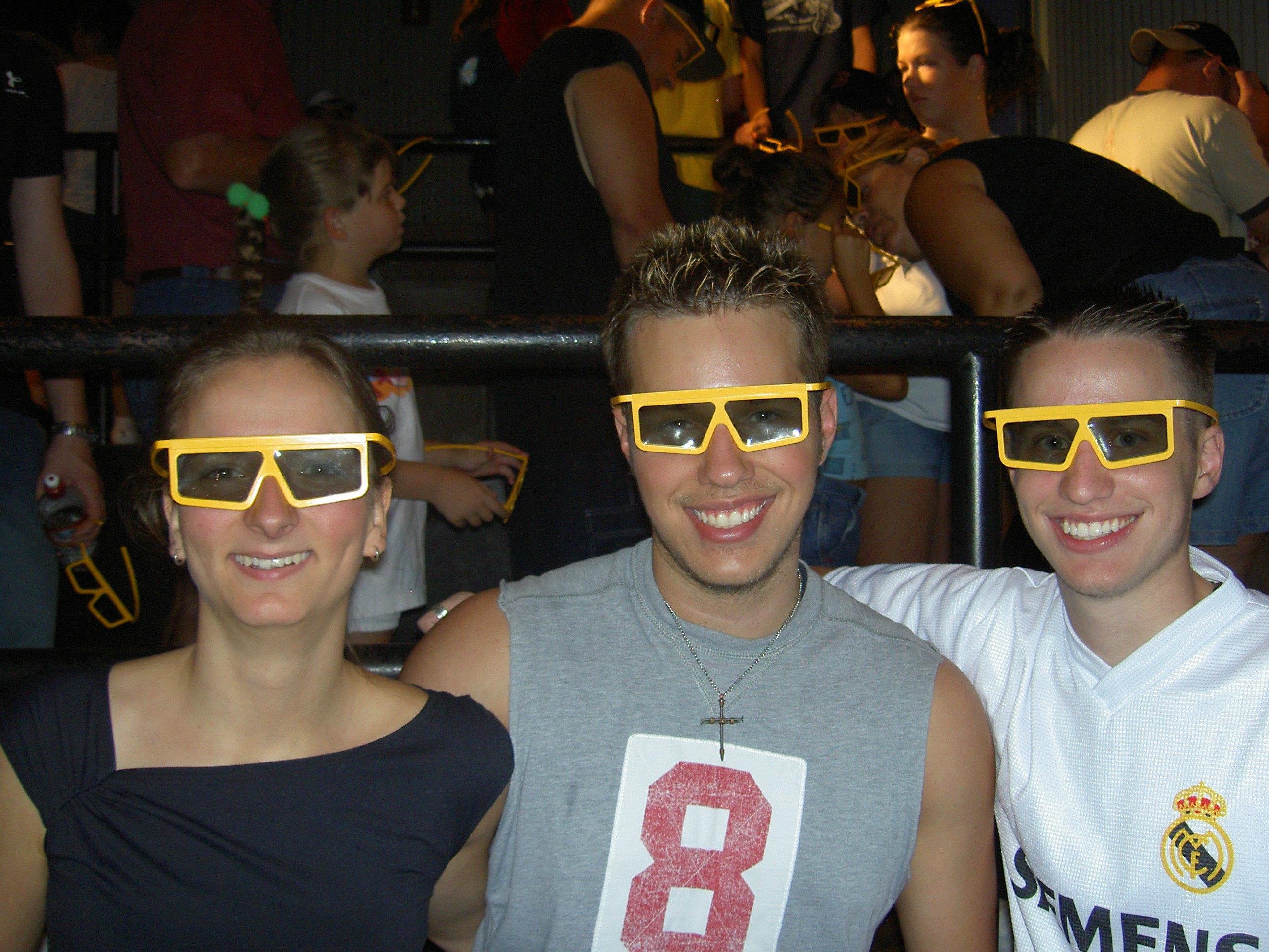 A group of people wearing sunglasses