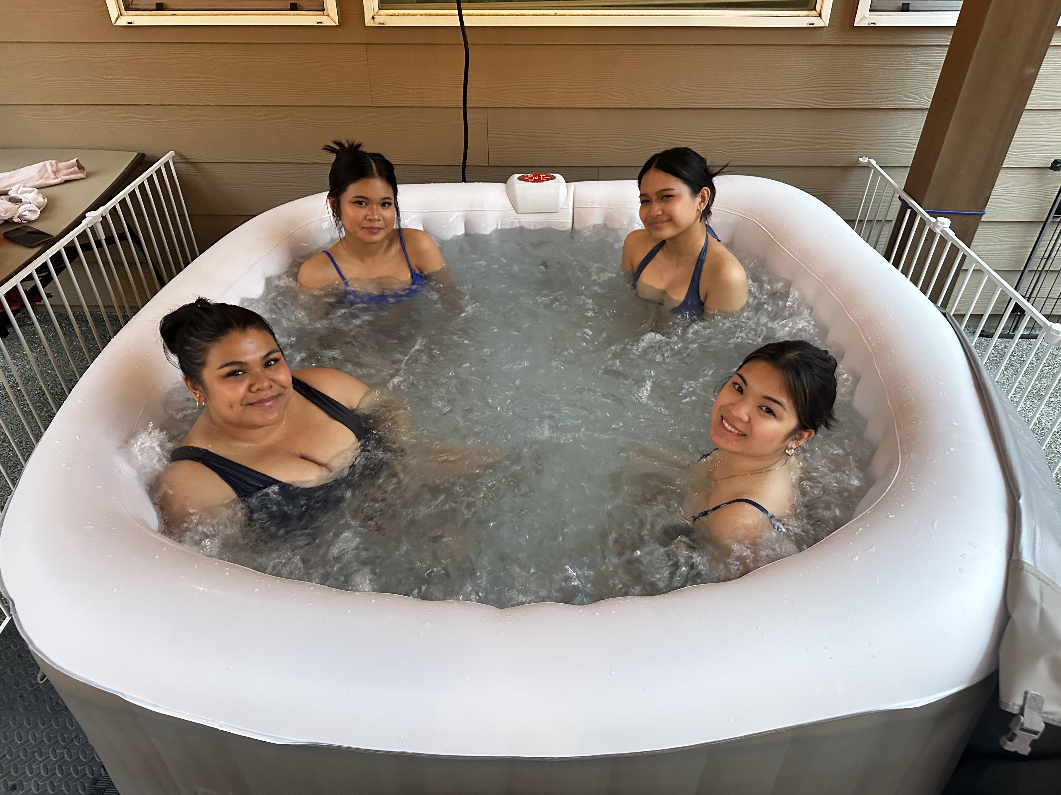 A group of women in a hot tub