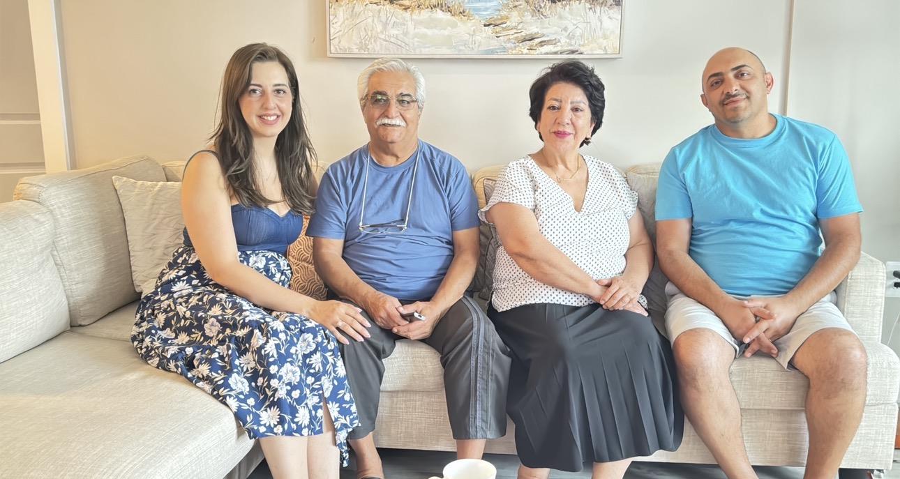 A group of people sitting on a couch