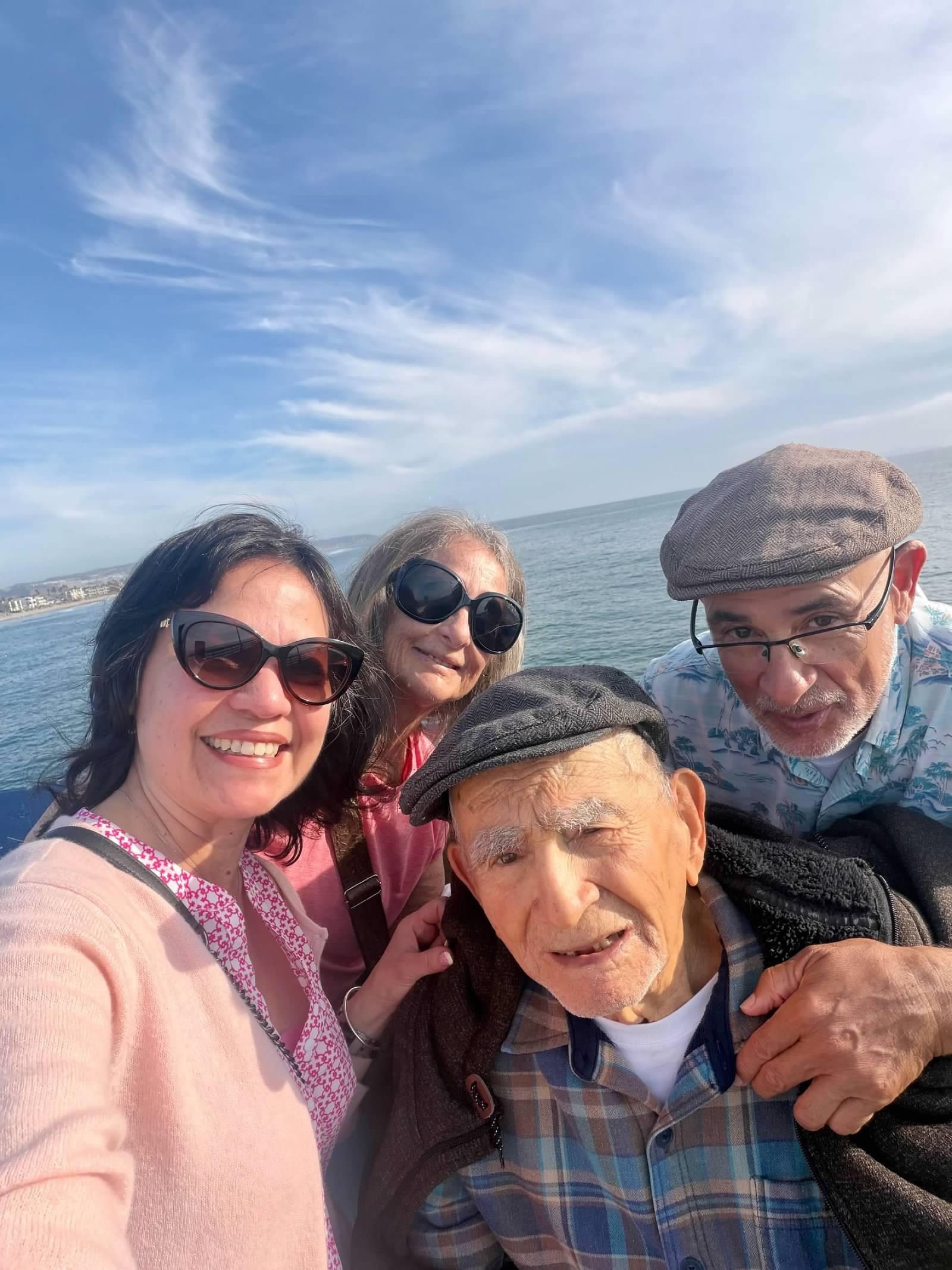 A group of people taking a selfie on a boat