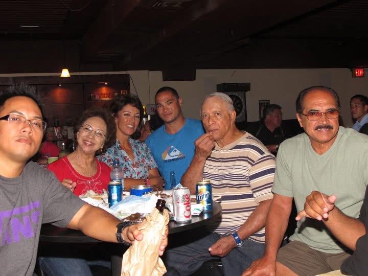 A group of people sitting around a table