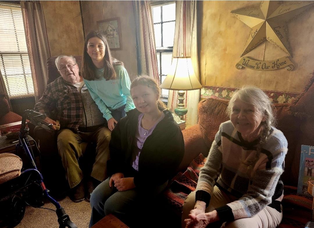 A group of people sitting on couches