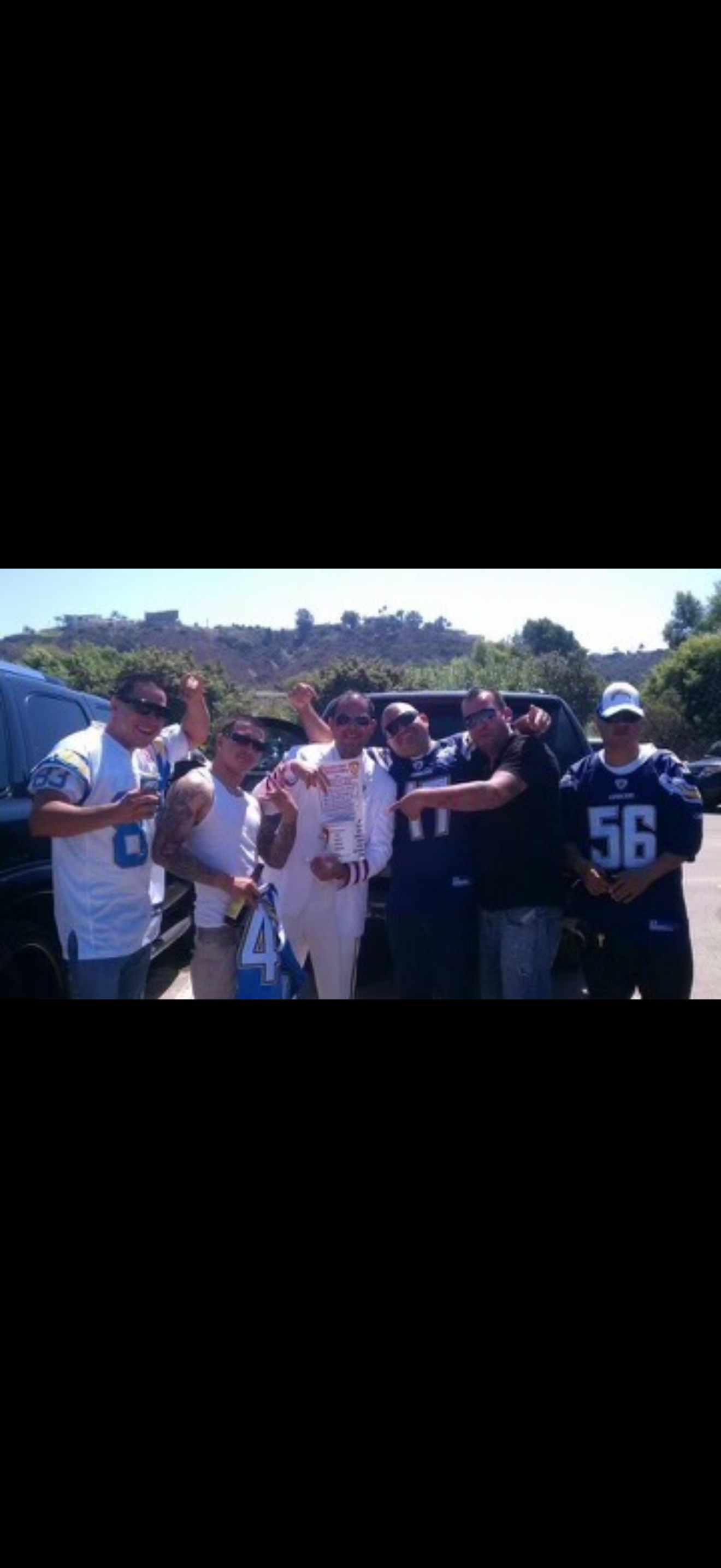 A group of men posing for a picture