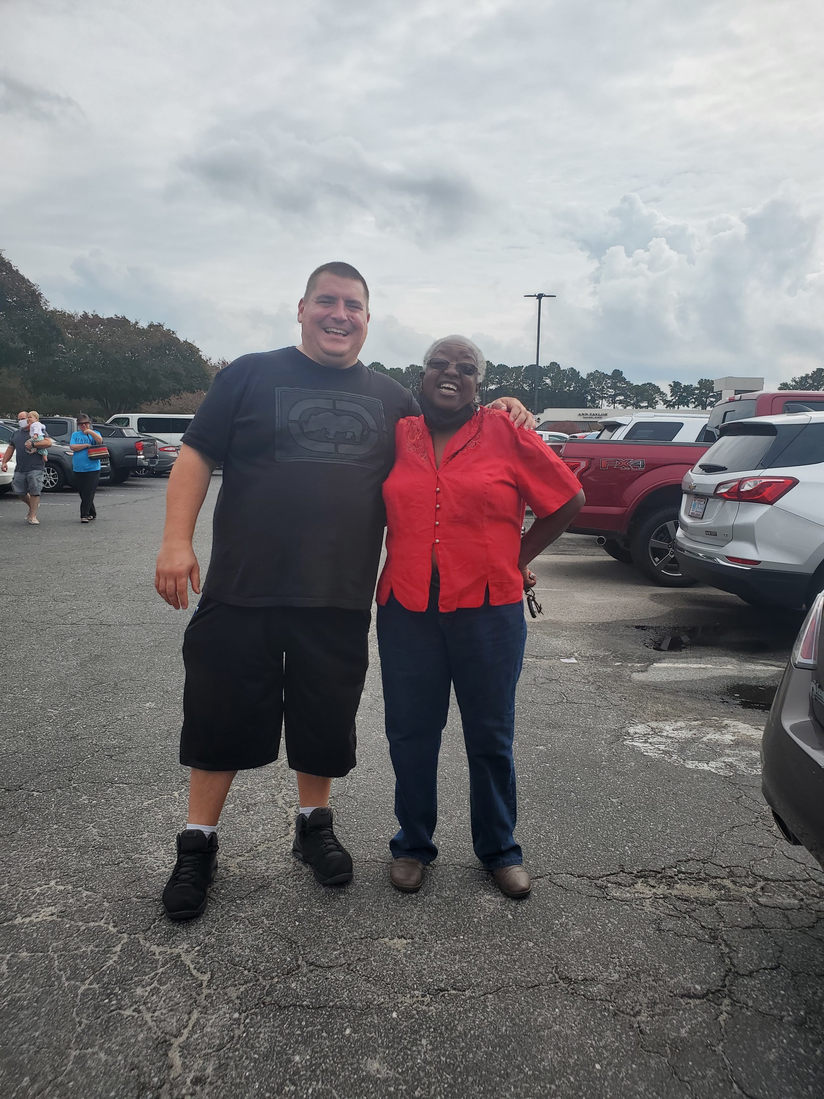 A man and woman posing for a picture