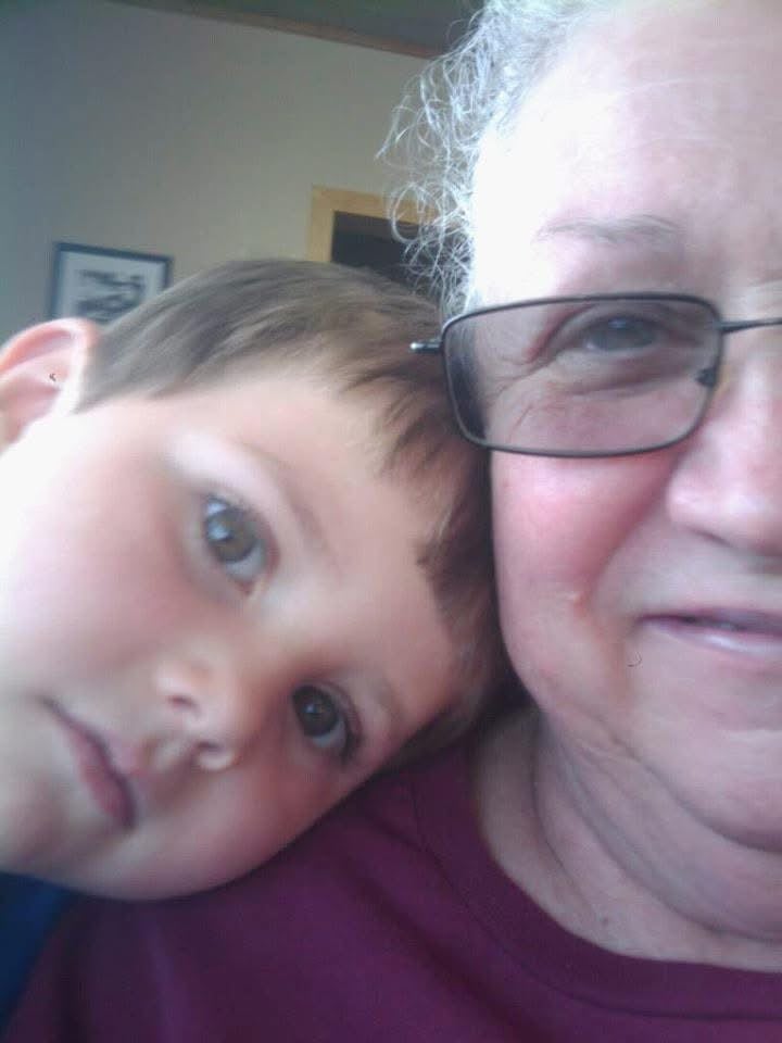 A woman and child taking a selfie
