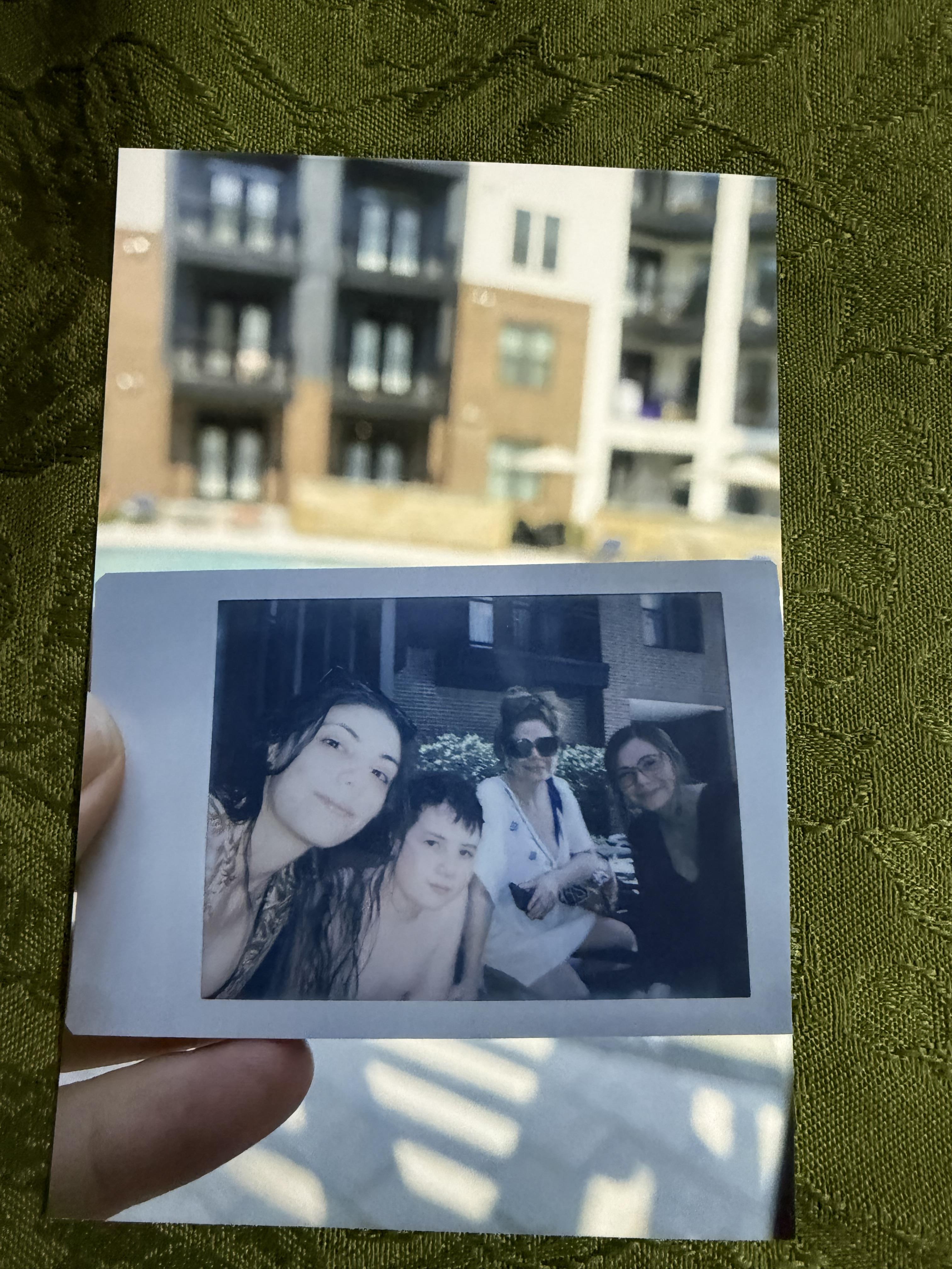 A polaroid of a group of people
