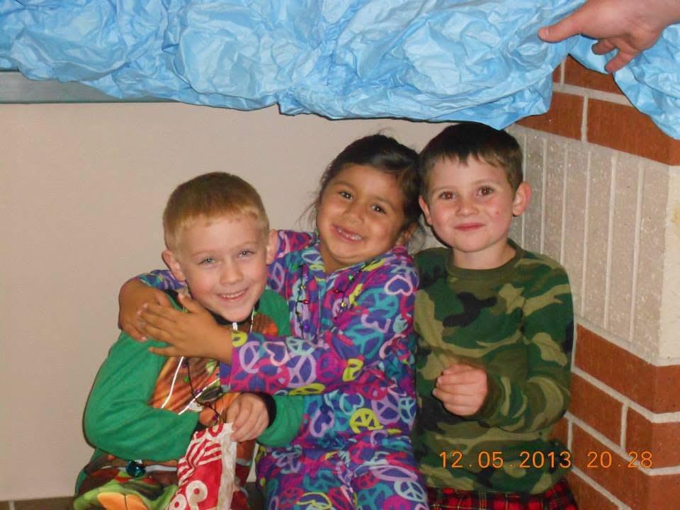 A group of children smiling